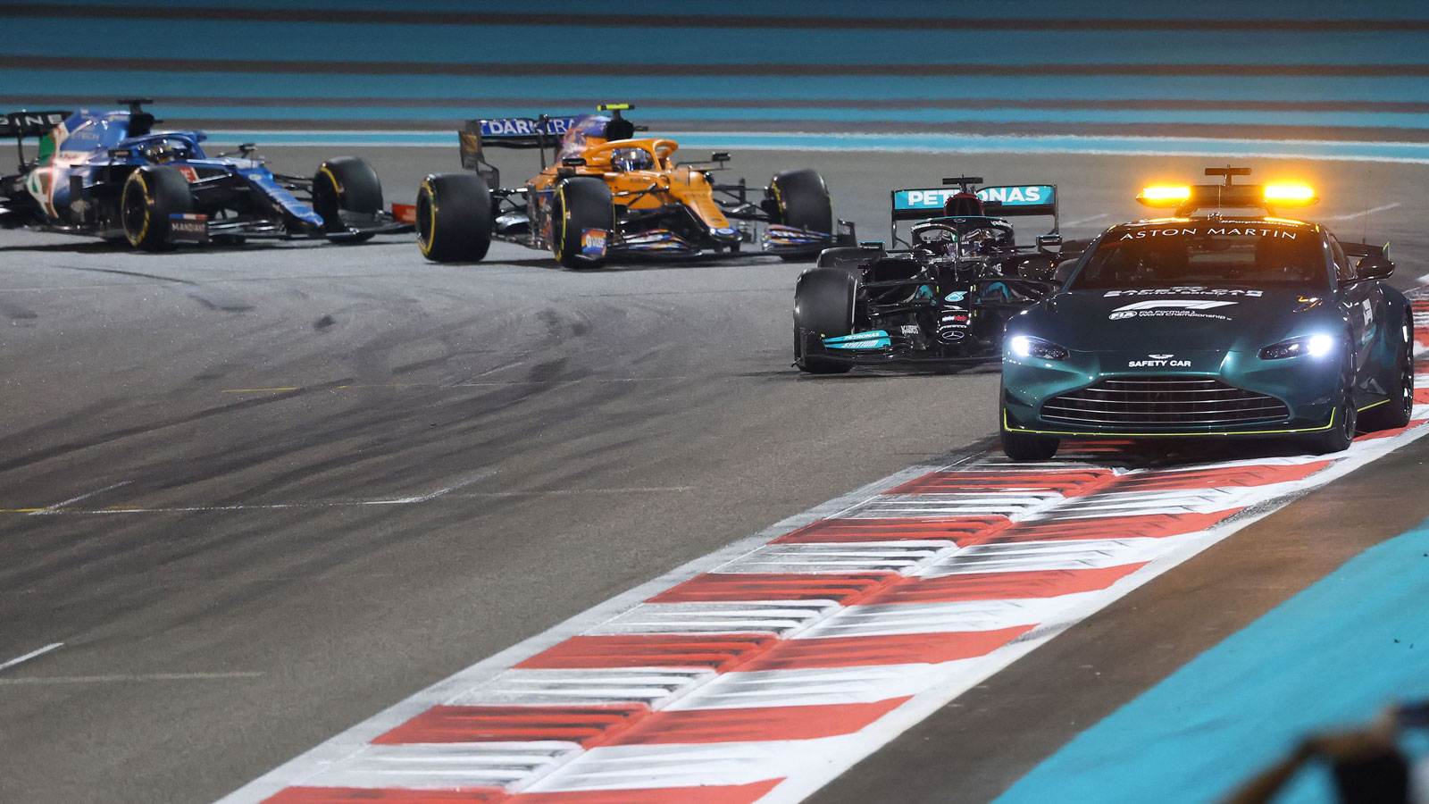 The Formula 1 cars follow the safety car in Abu Dhabi 