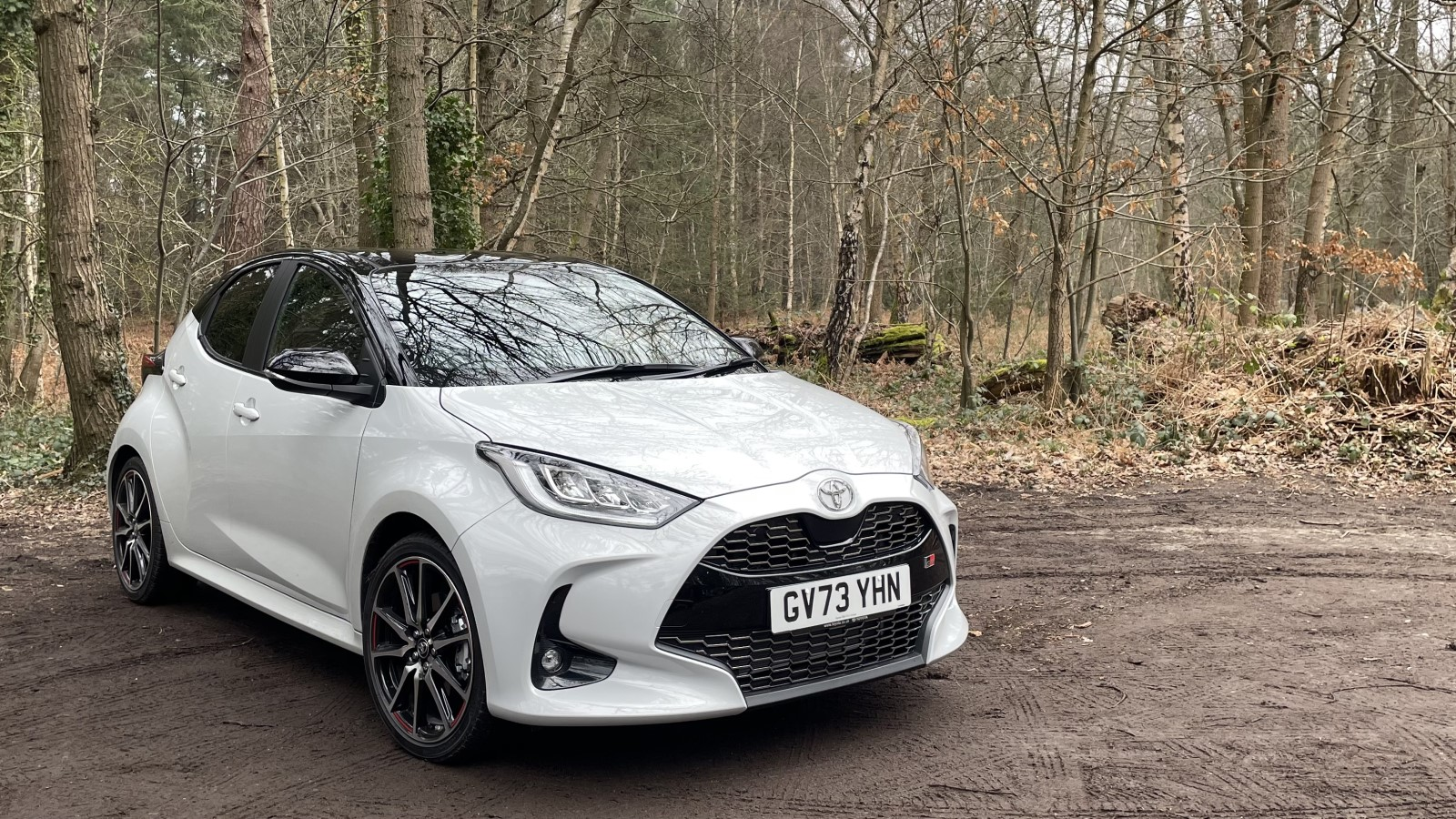 A photo of a white Toyota Yaris GR Sport. 