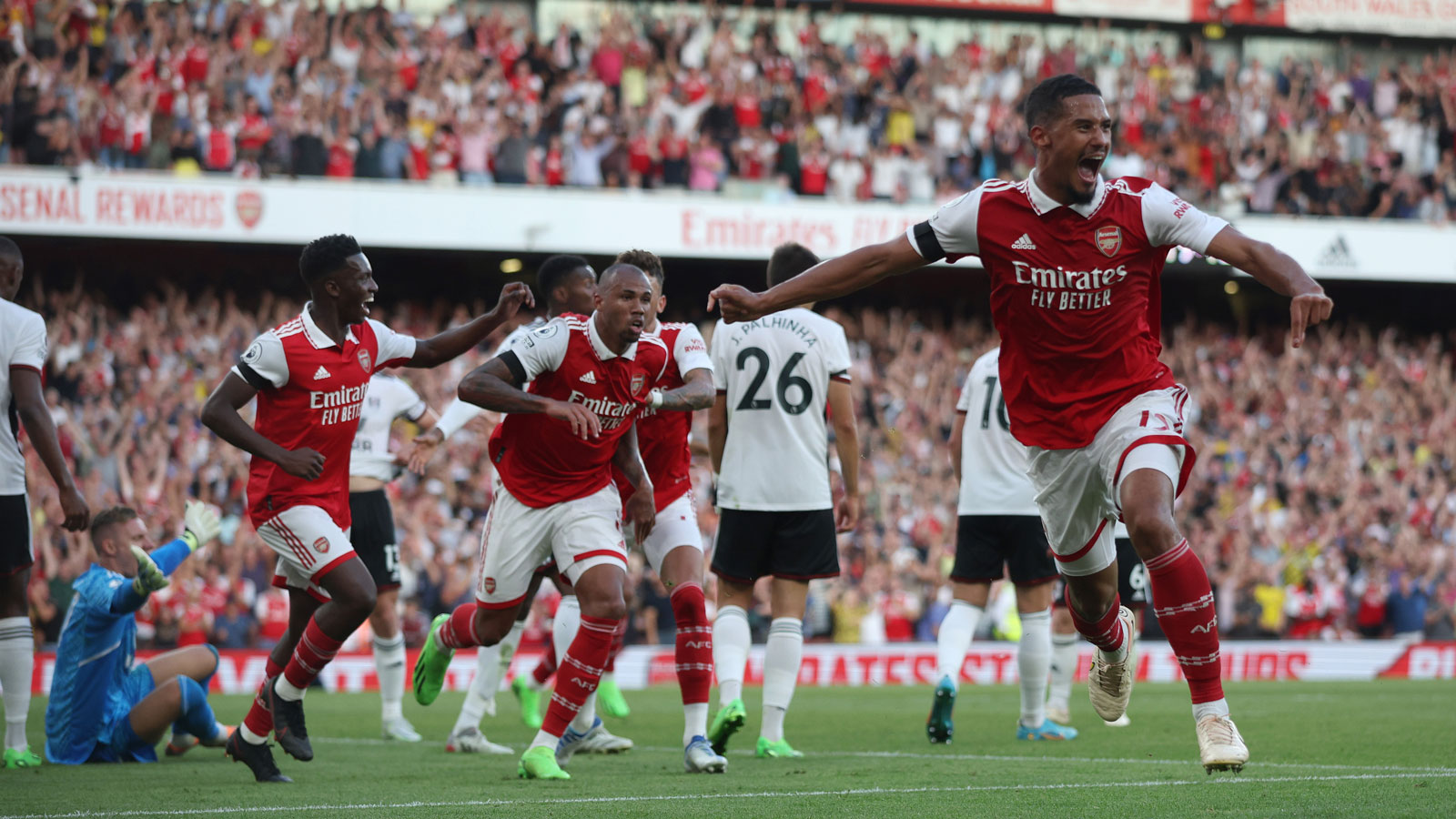 A photo of the Arsenal Team celebrating after a goal. 