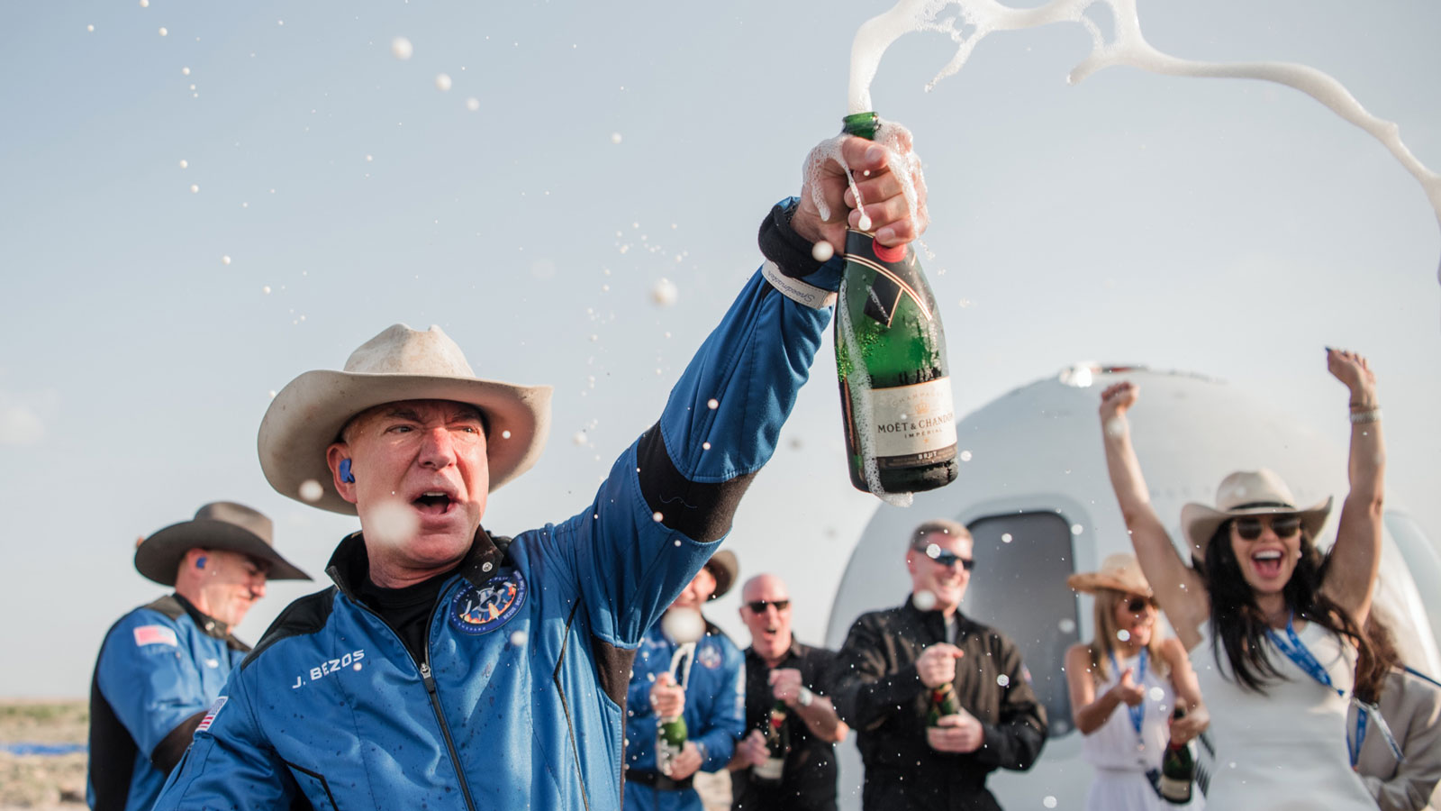 Jeff Bezos sprays Champagne after traveling to space 