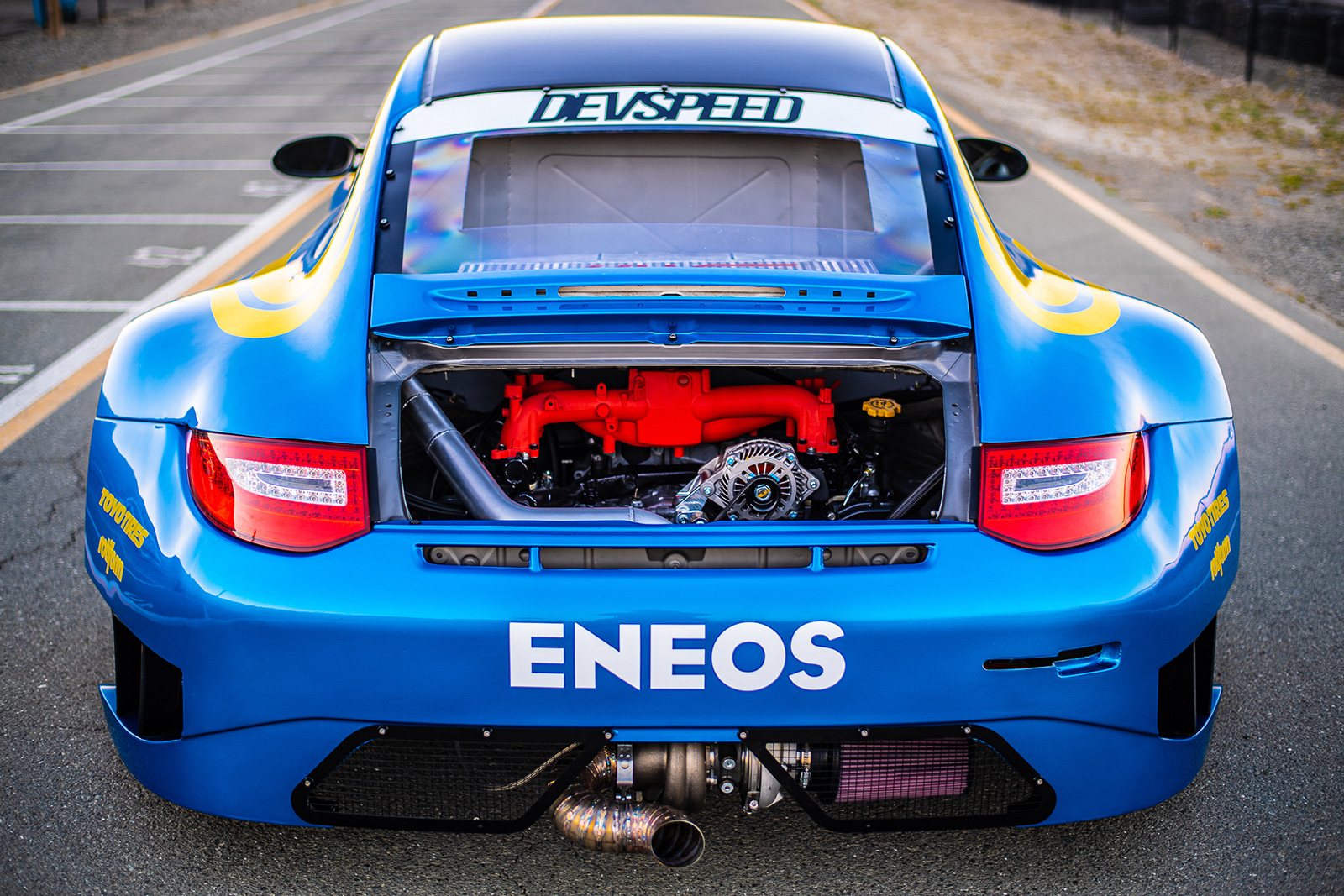 Rear view and engine bay of Porsche 911 GT3 STI built by DevSpeed Motorsports for Eneos.