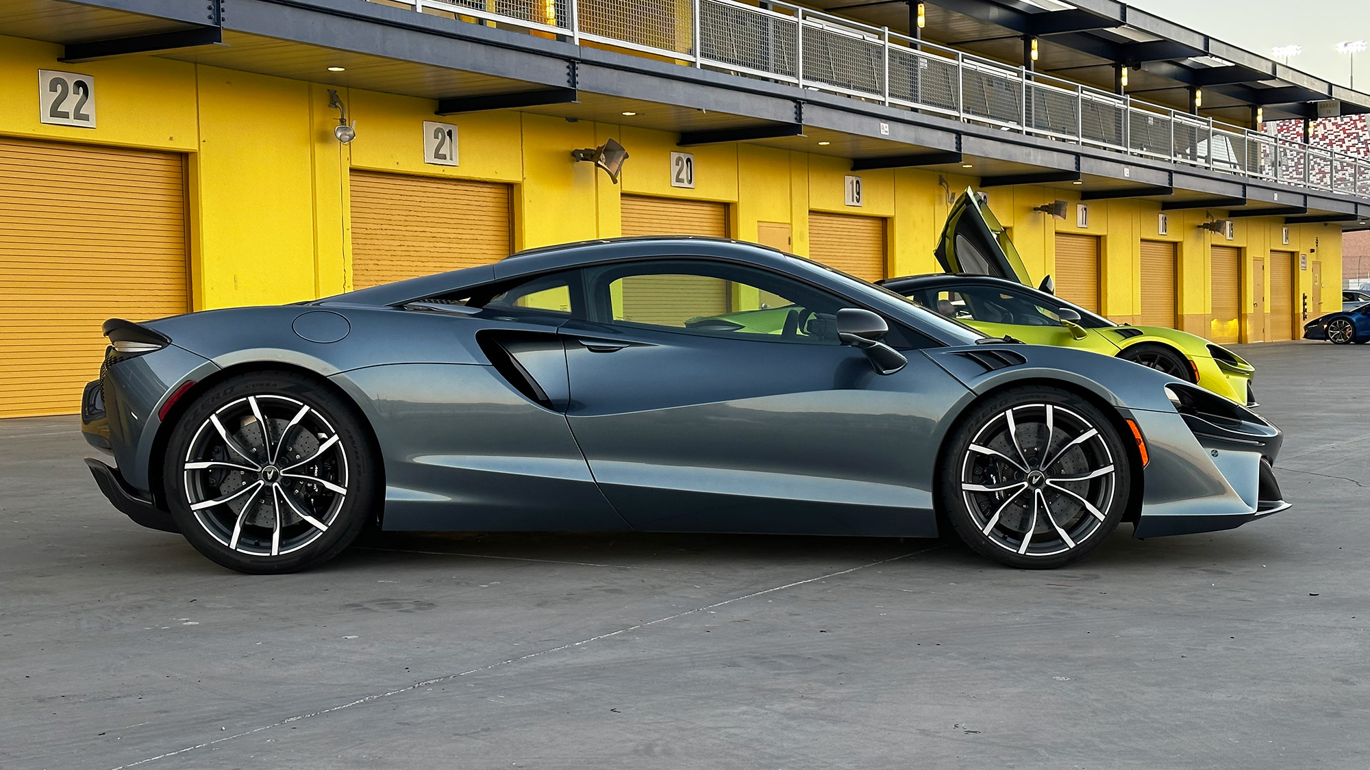 Side view of 2023 McLaren Artura in gray.