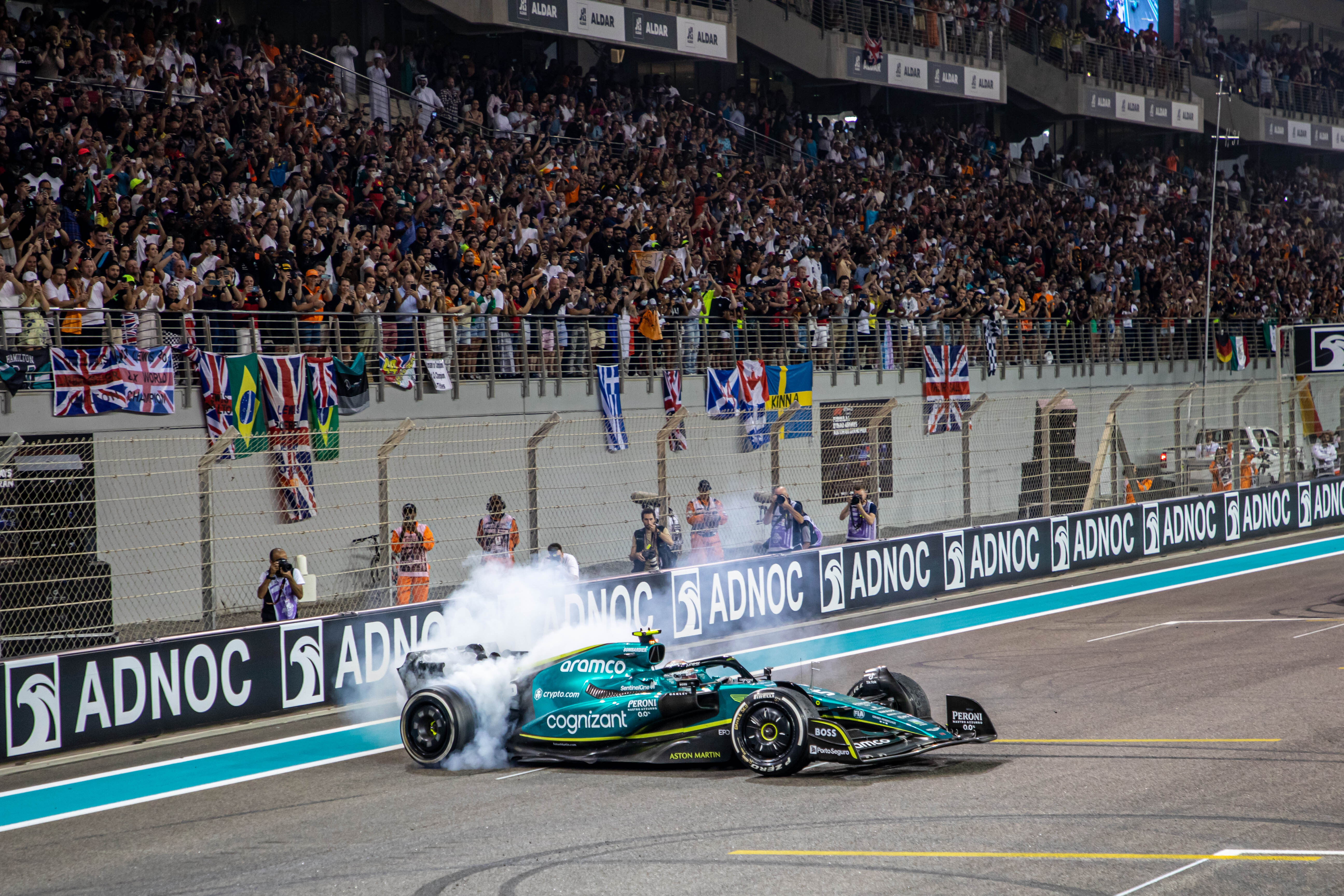 Sebastian Vettel doing donuts on the Yas Marina pit straight after his final F1 race