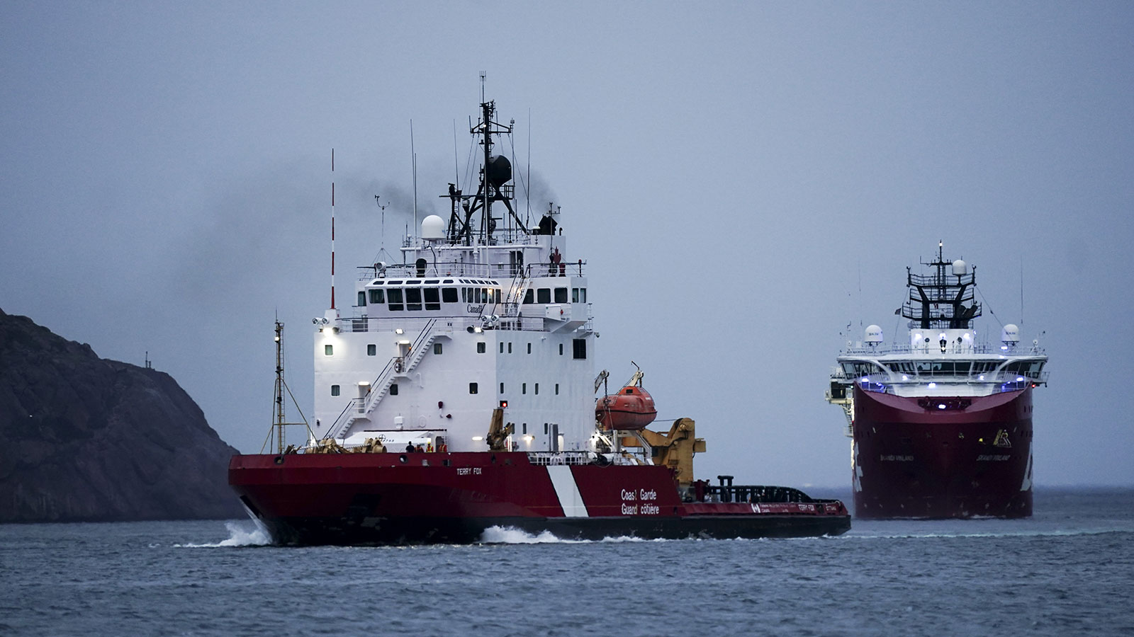 A photo of two research ships joining the search for the Titan. 