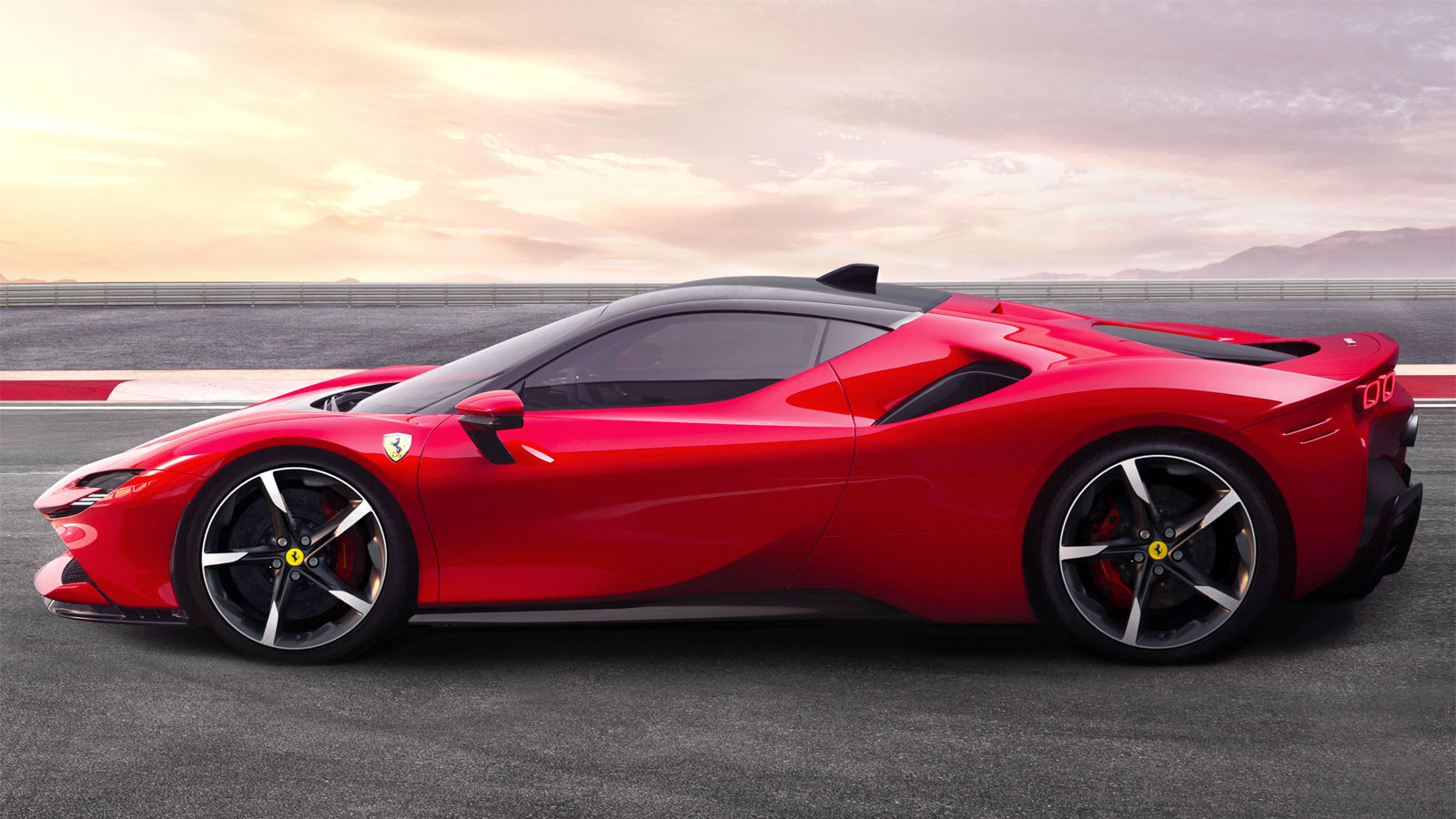 A photo of a red Ferrari SF90 supercar. 