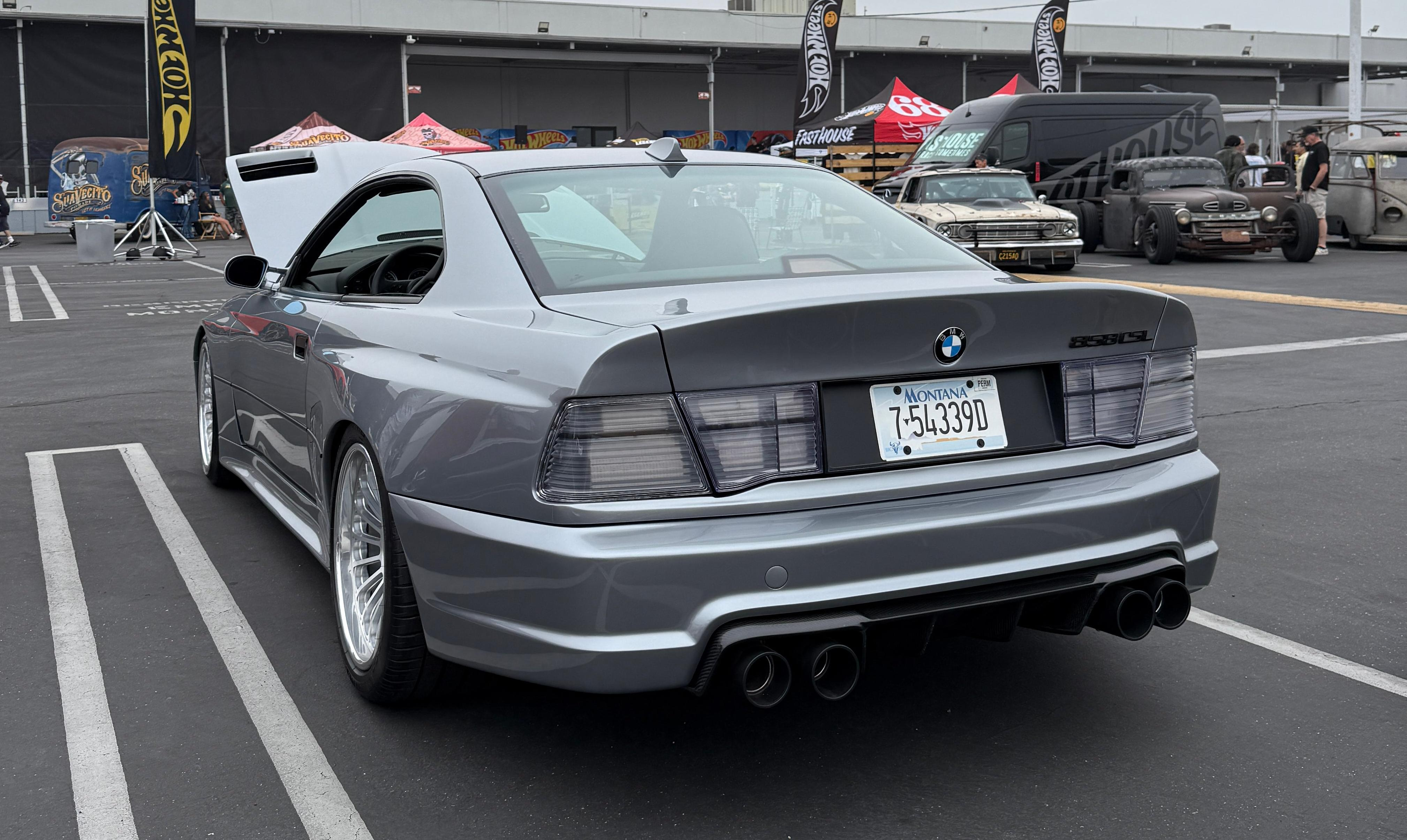 Rear 3/4 view of the silver BMW 858 CSL