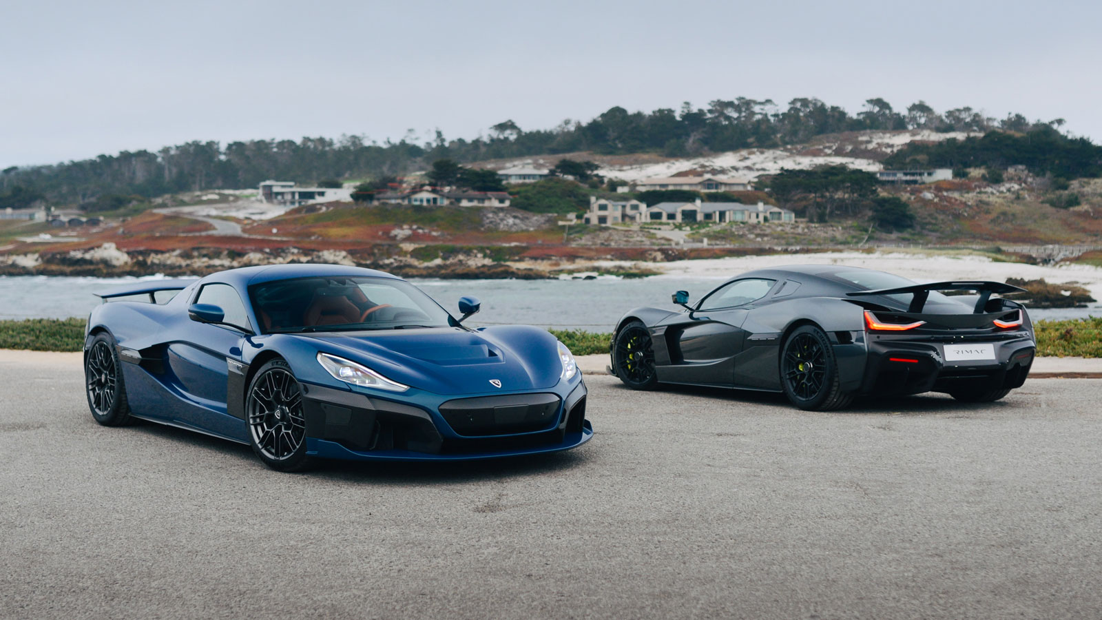 Two Rimac electric cars parked in a lot 