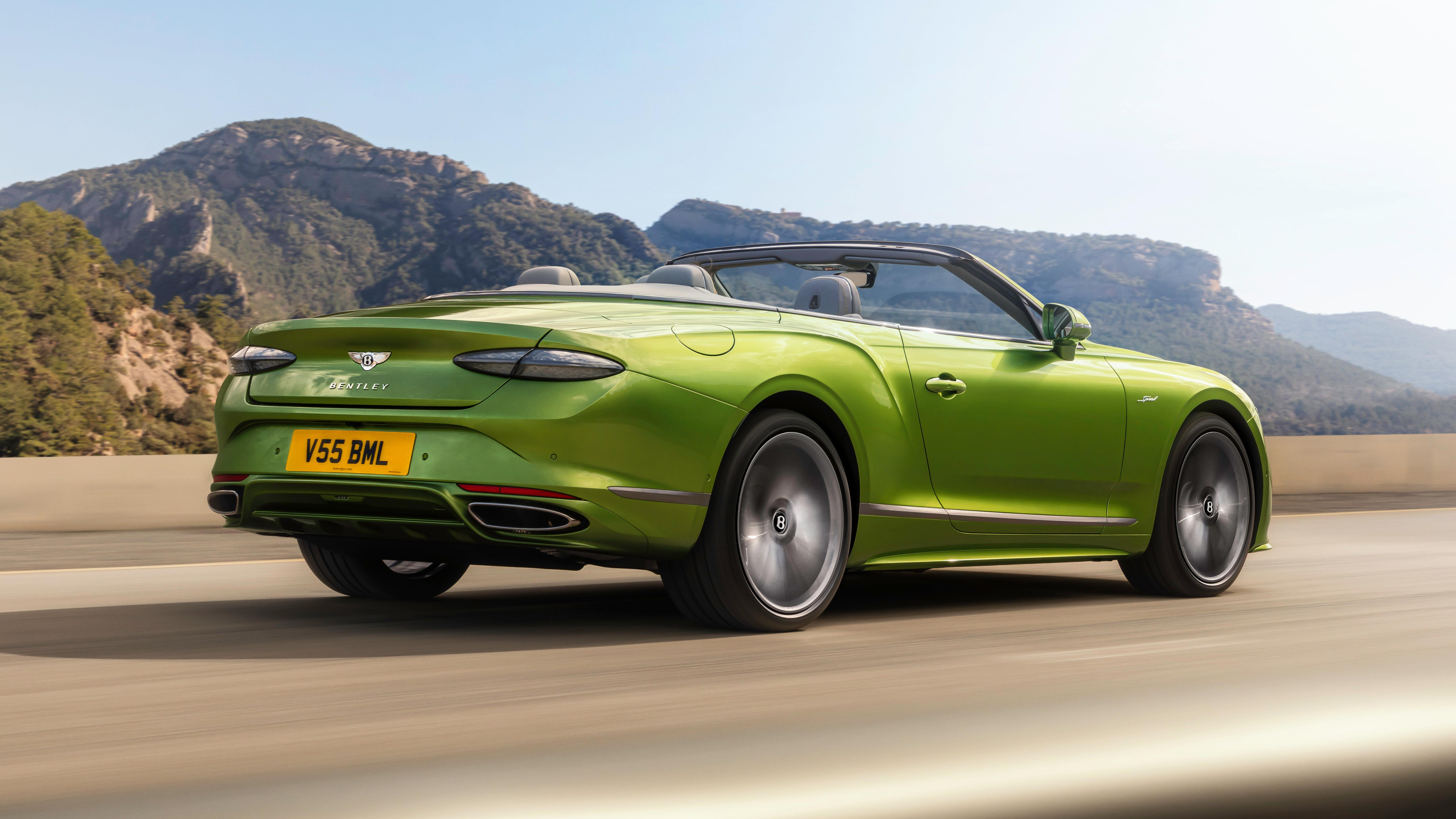 Rear 3/4 view of a green Bentley Continental GTC Speed