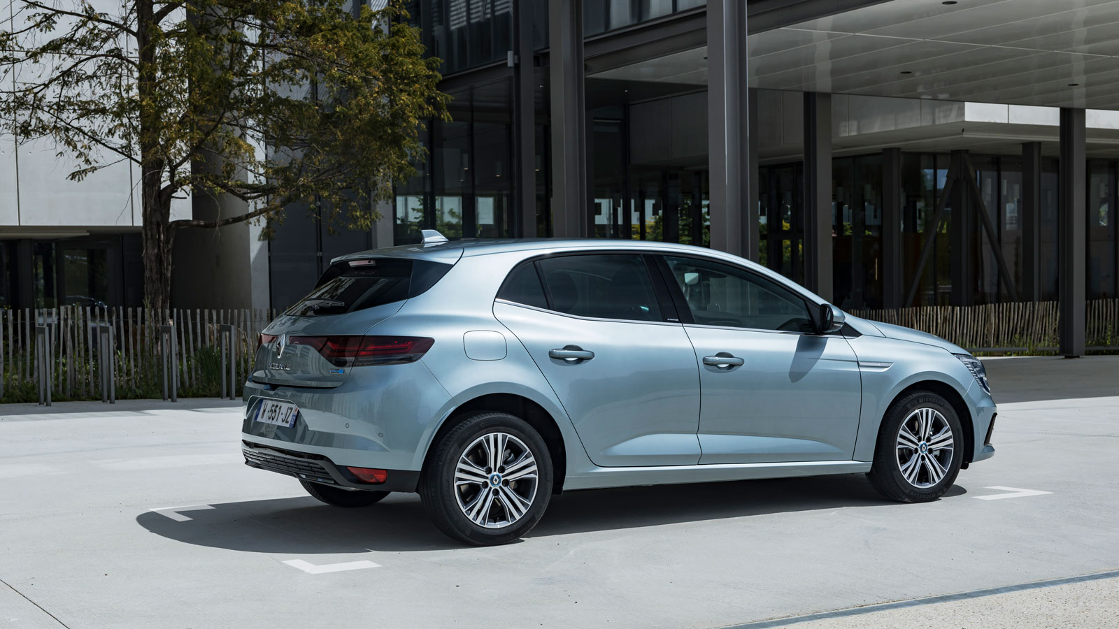 A photo of a pale blue Renault Megane hatchback. 