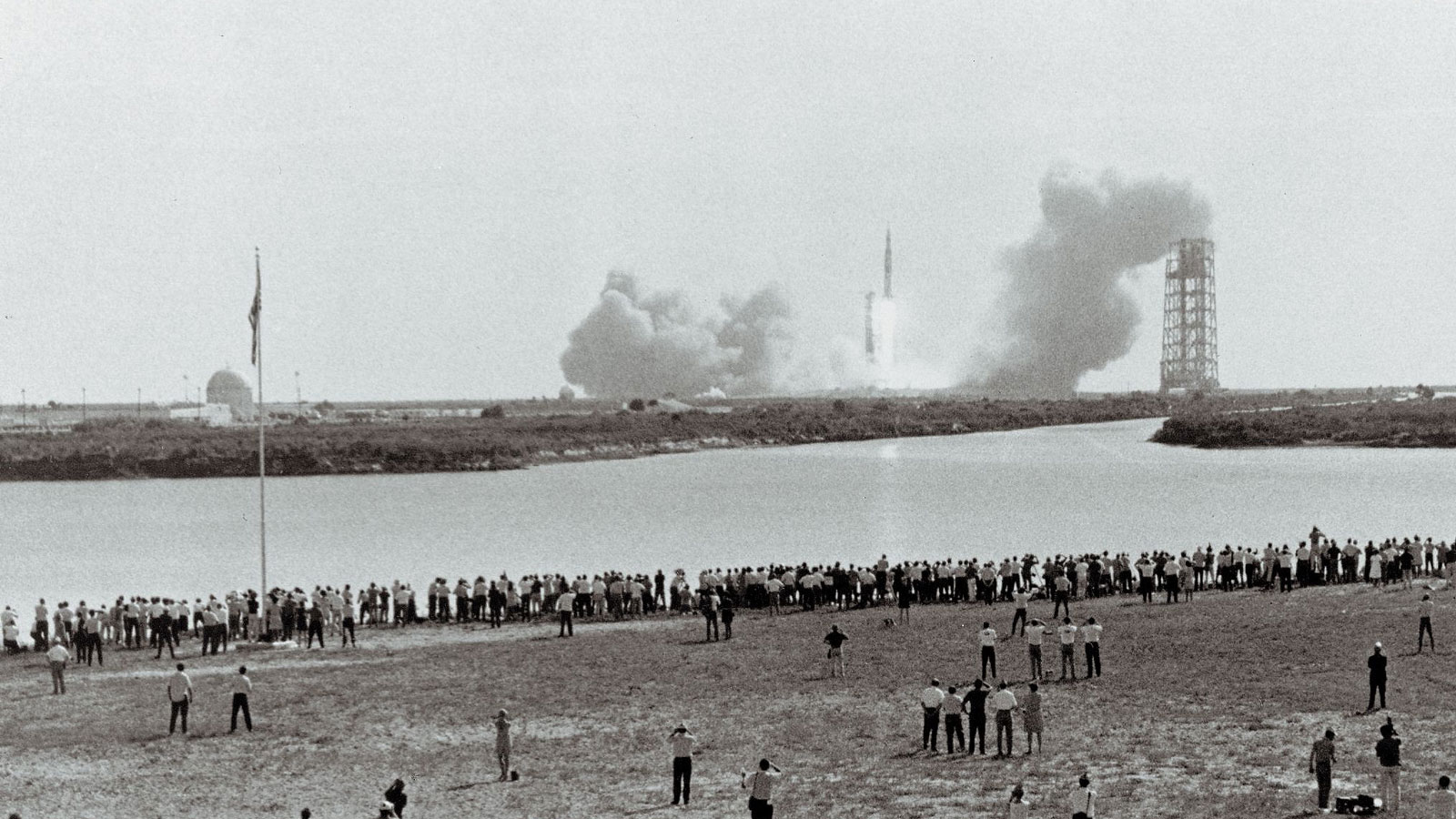 A black and white photo of the Apollo 11 launch in 1969