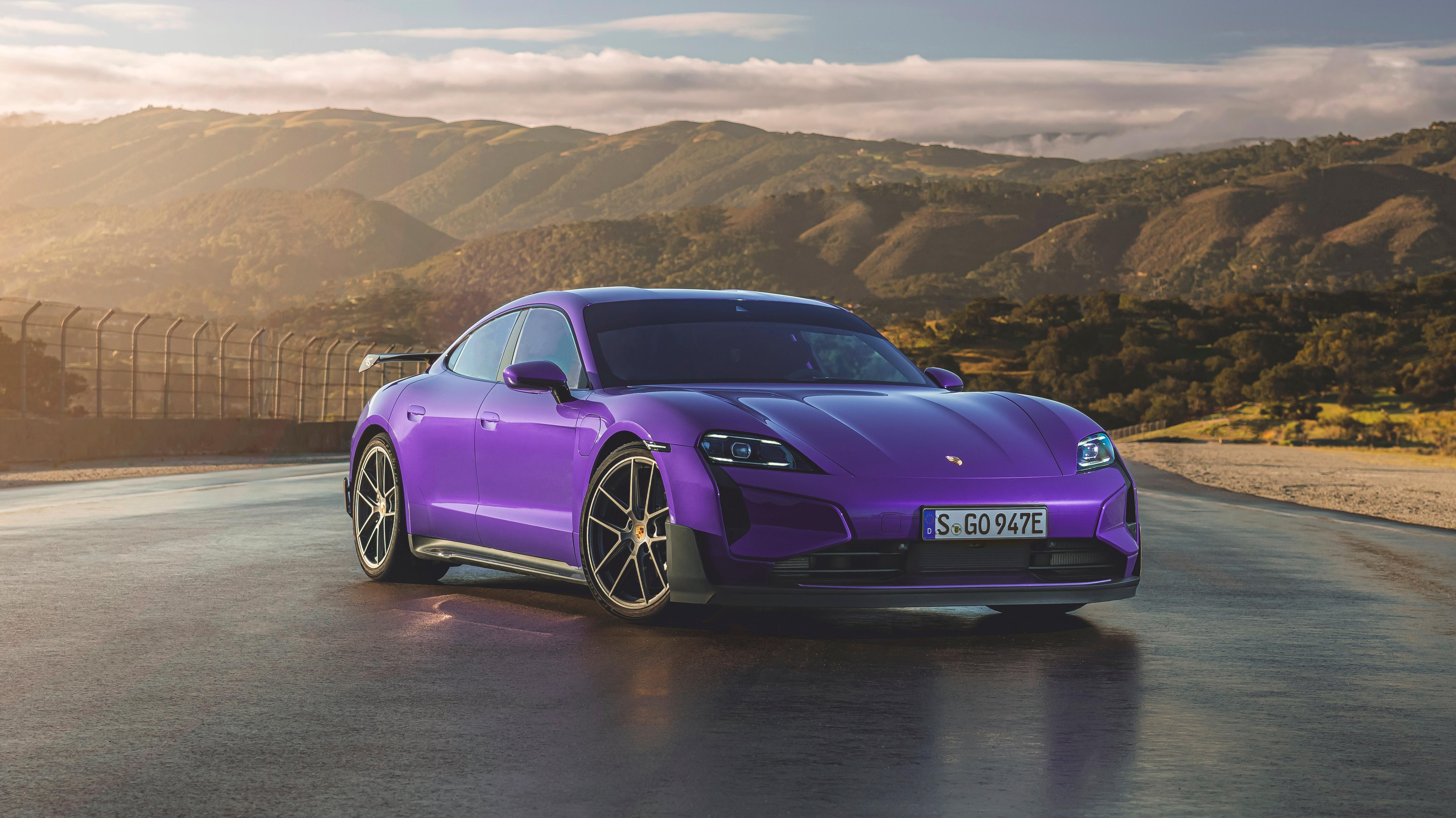 Front 3/4 view of a purple Porsche Taycan Turbo GT