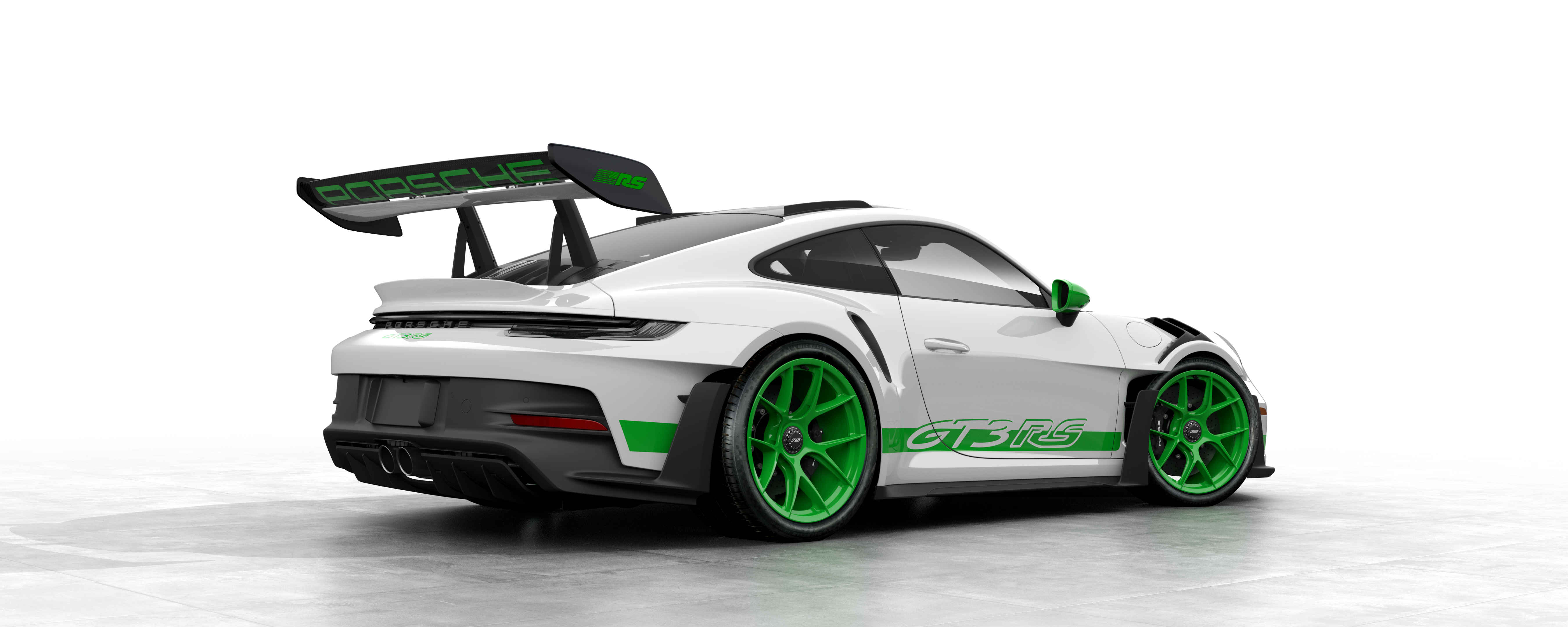 A rear three-quarters view of a white and green Porsche 911 GT3 R3 in front of a white background