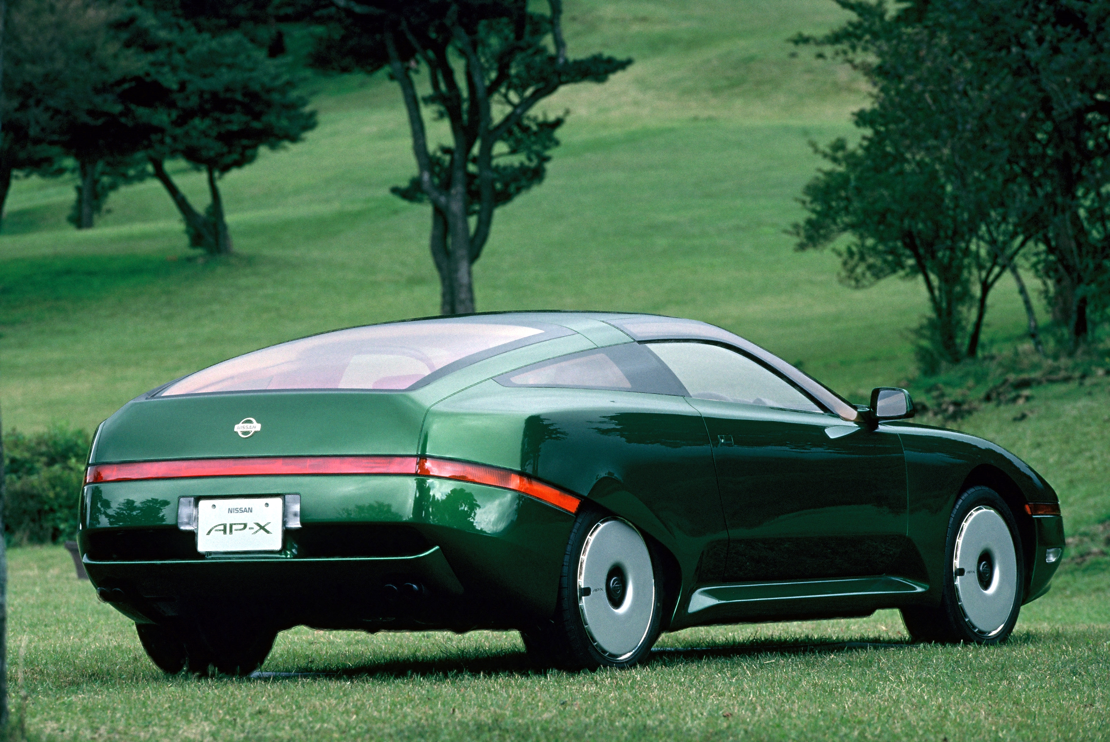 Rear 3/4 view of the green Nissan AP-X concept