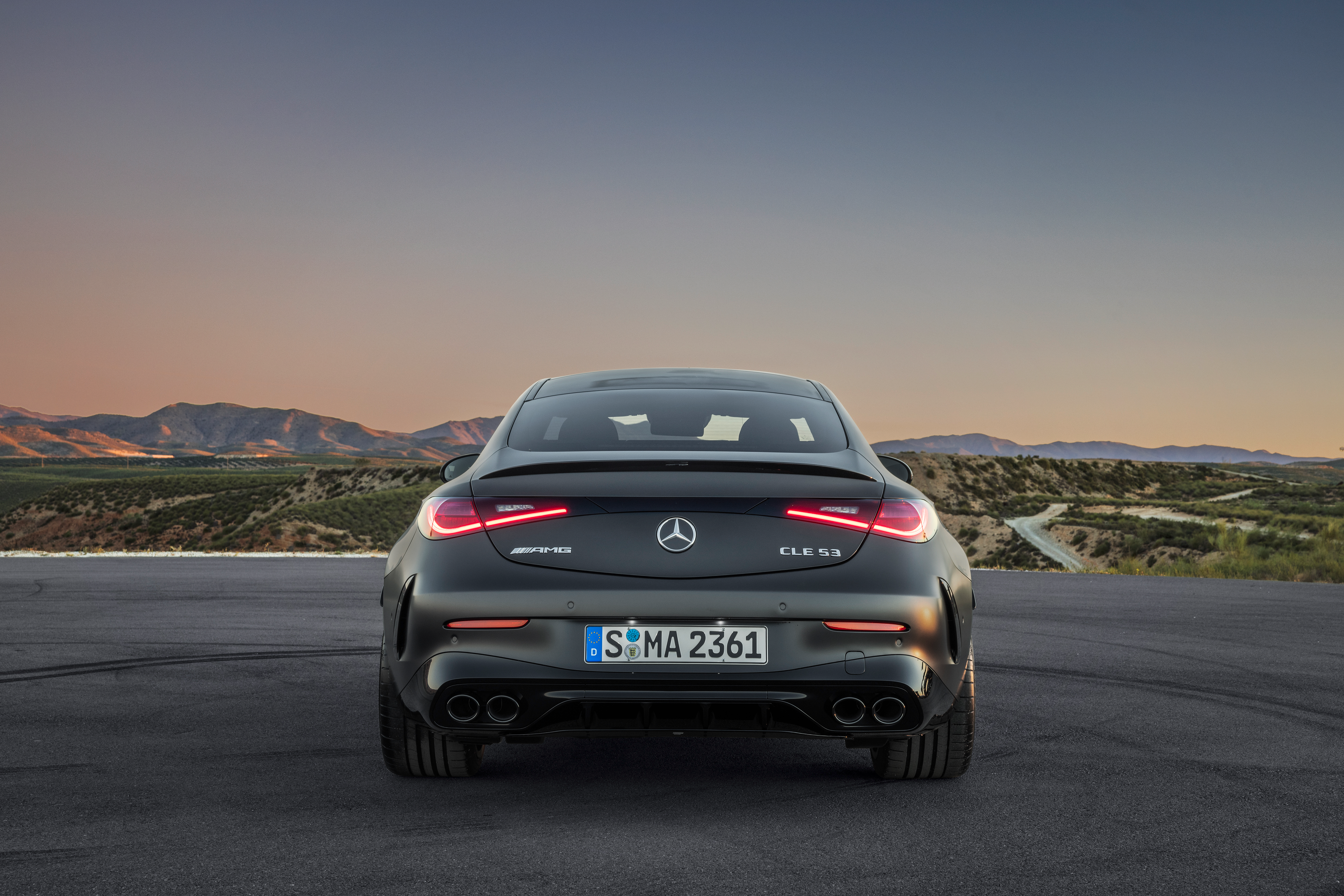 Rear view of a matte black Mercedes-AMG CLE53 coupe