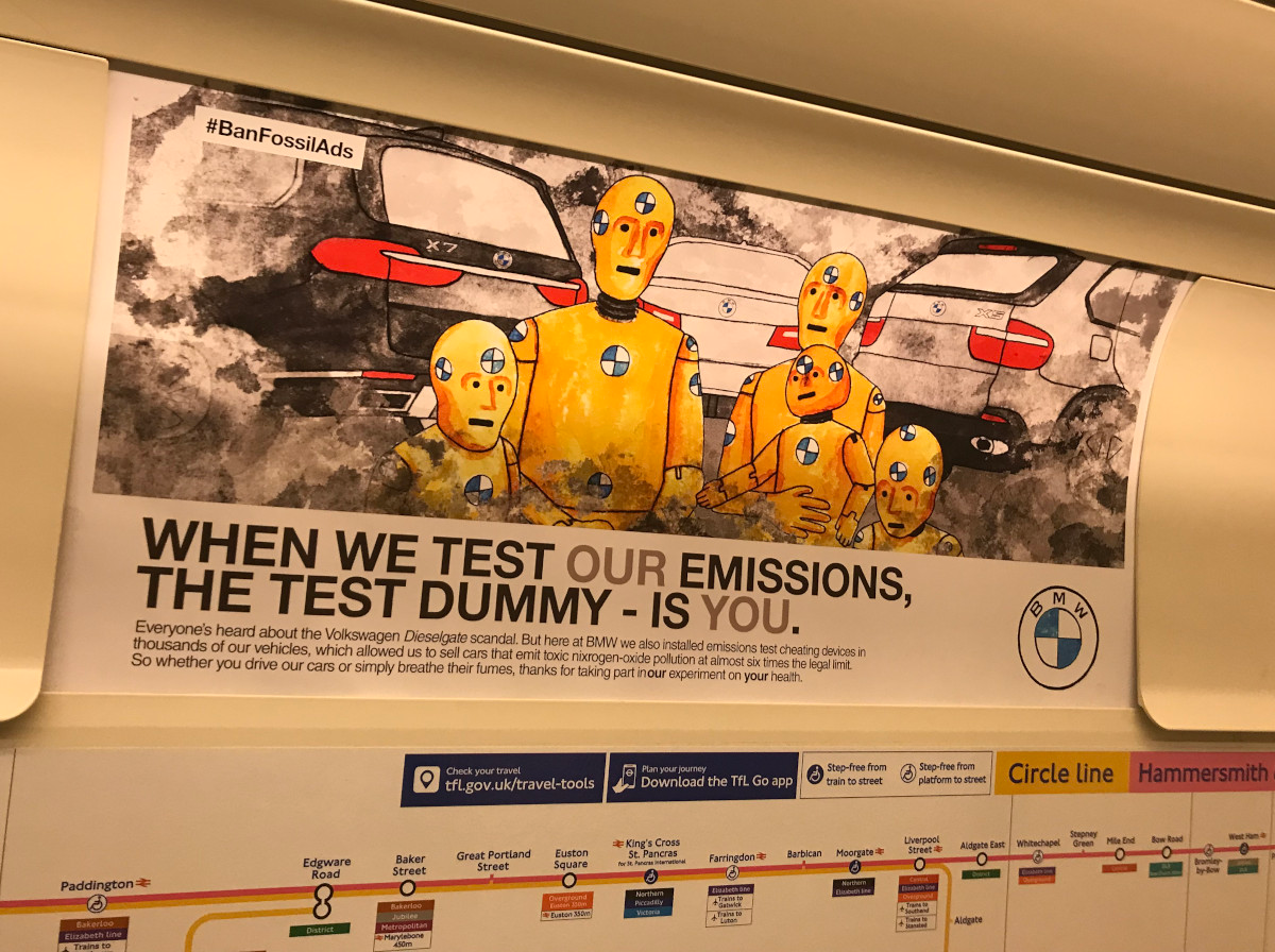 A BMW parody ad designed by Darren Cullen posted in a train car in the London Underground.