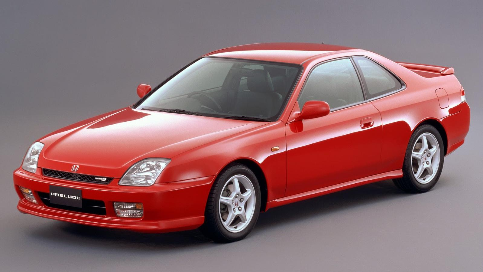 A red 1998 Honda Prelude.