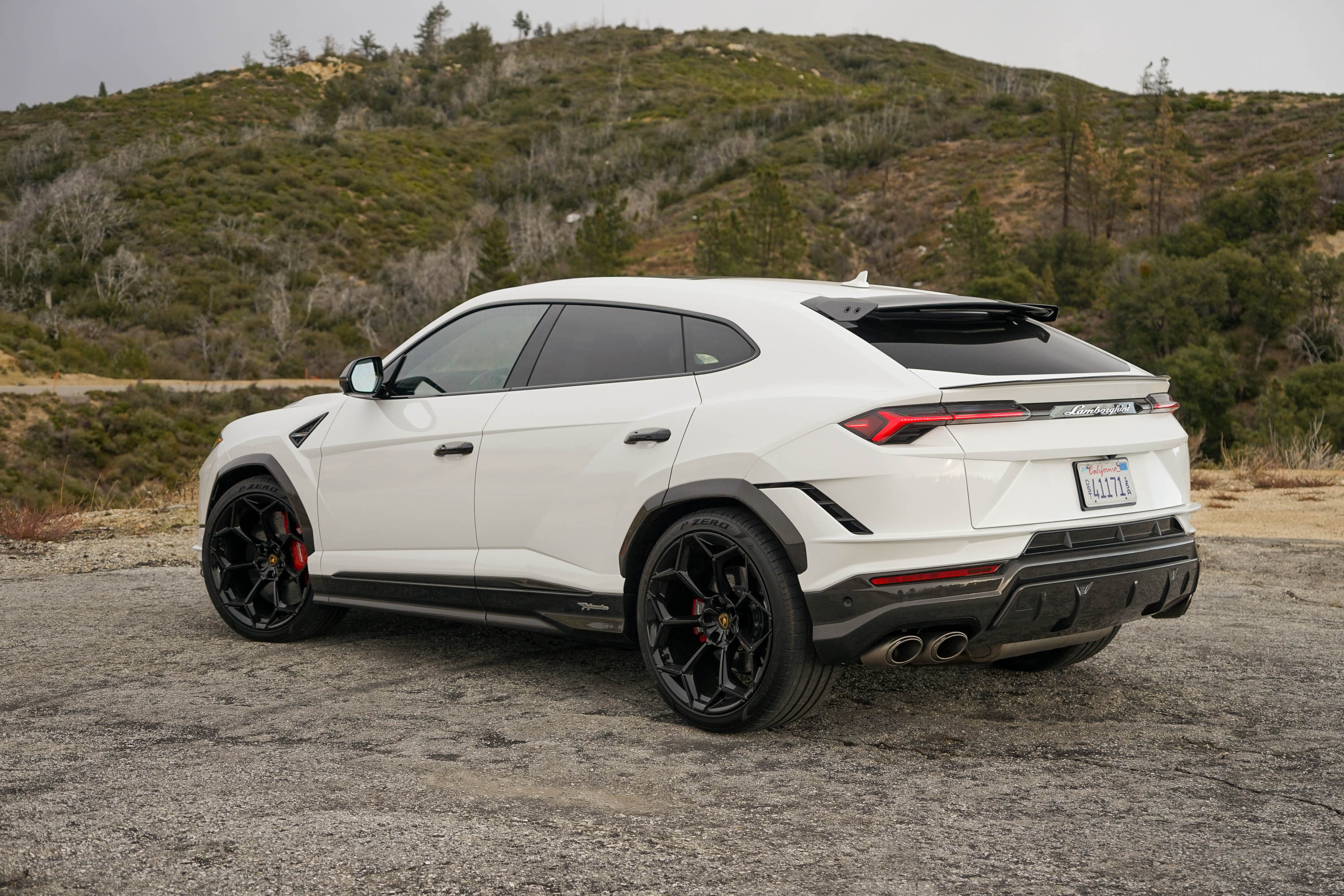 rear three quarter view of a white 2023 Lamborghini Urus Performante