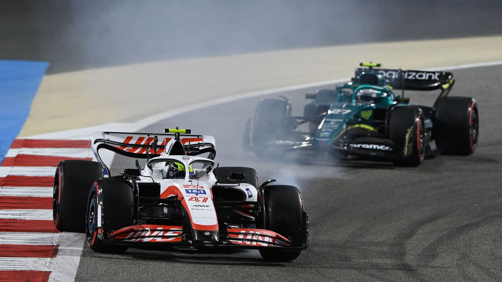 A photo of Mick Schumacher and Nico Hulkenberg racing in Formula 1. 