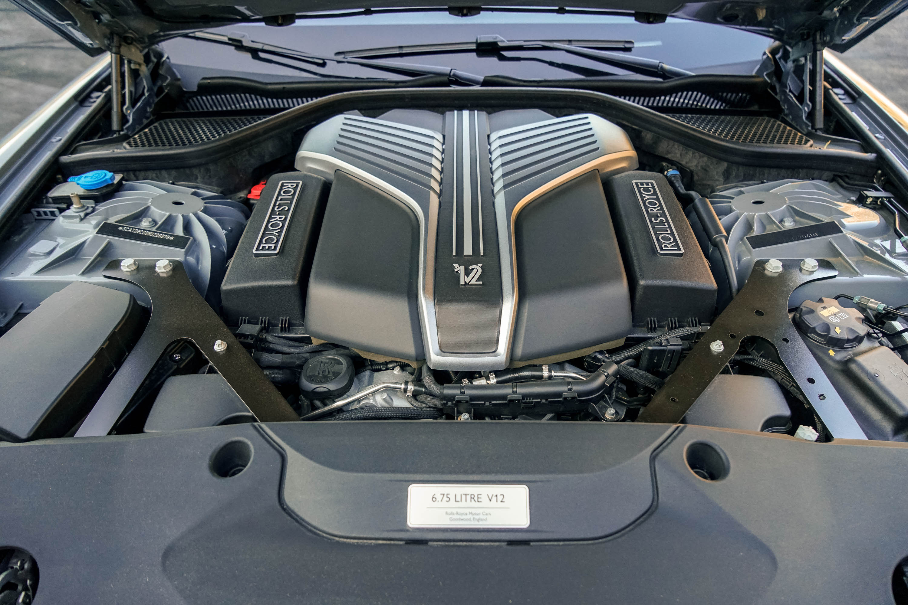 The 6.75-liter twin-turbo V12 engine of the 2023 Rolls-Royce Black Badge Ghost