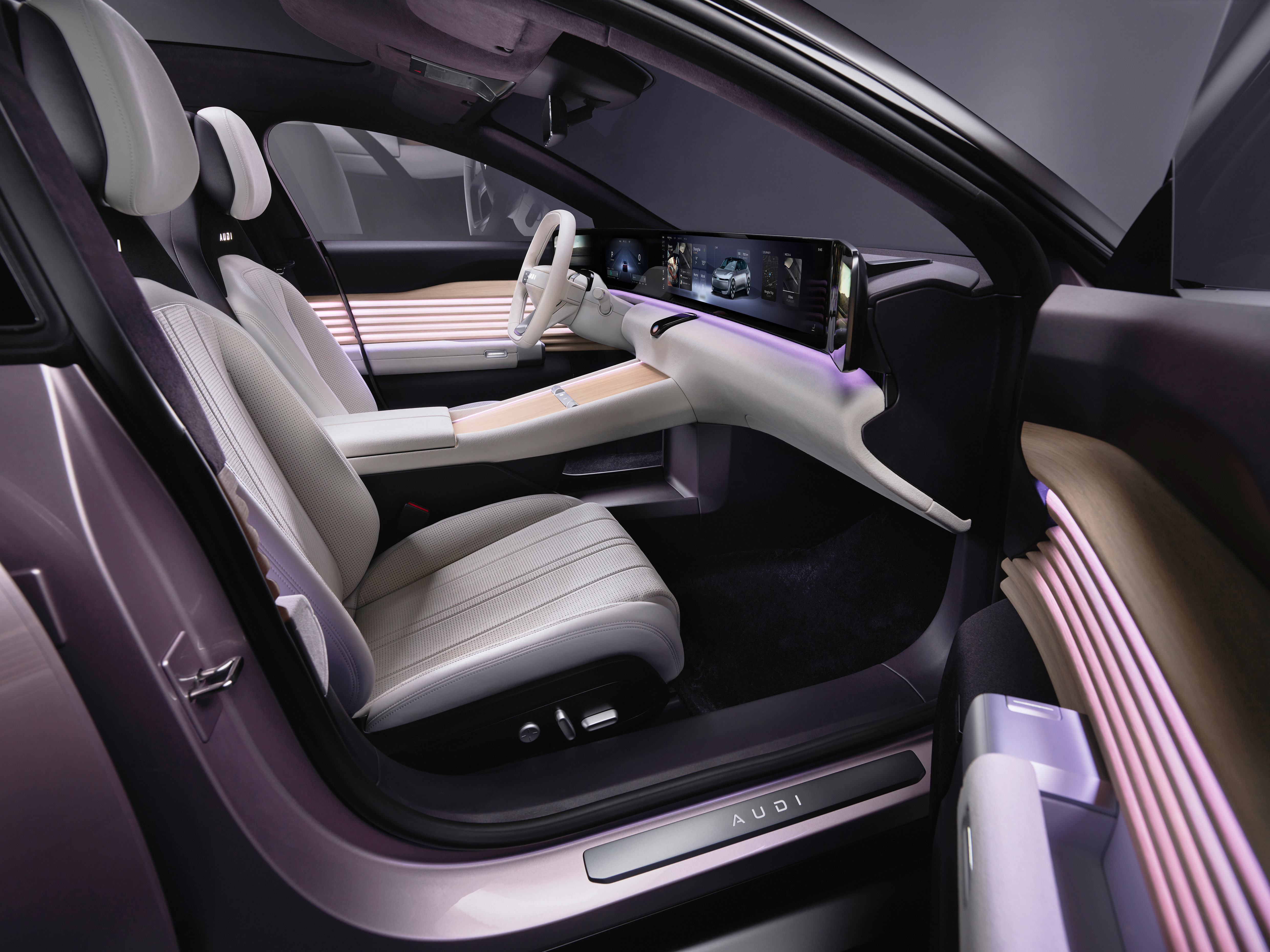 Front seats and dashboard of the pink AUDI E Concept