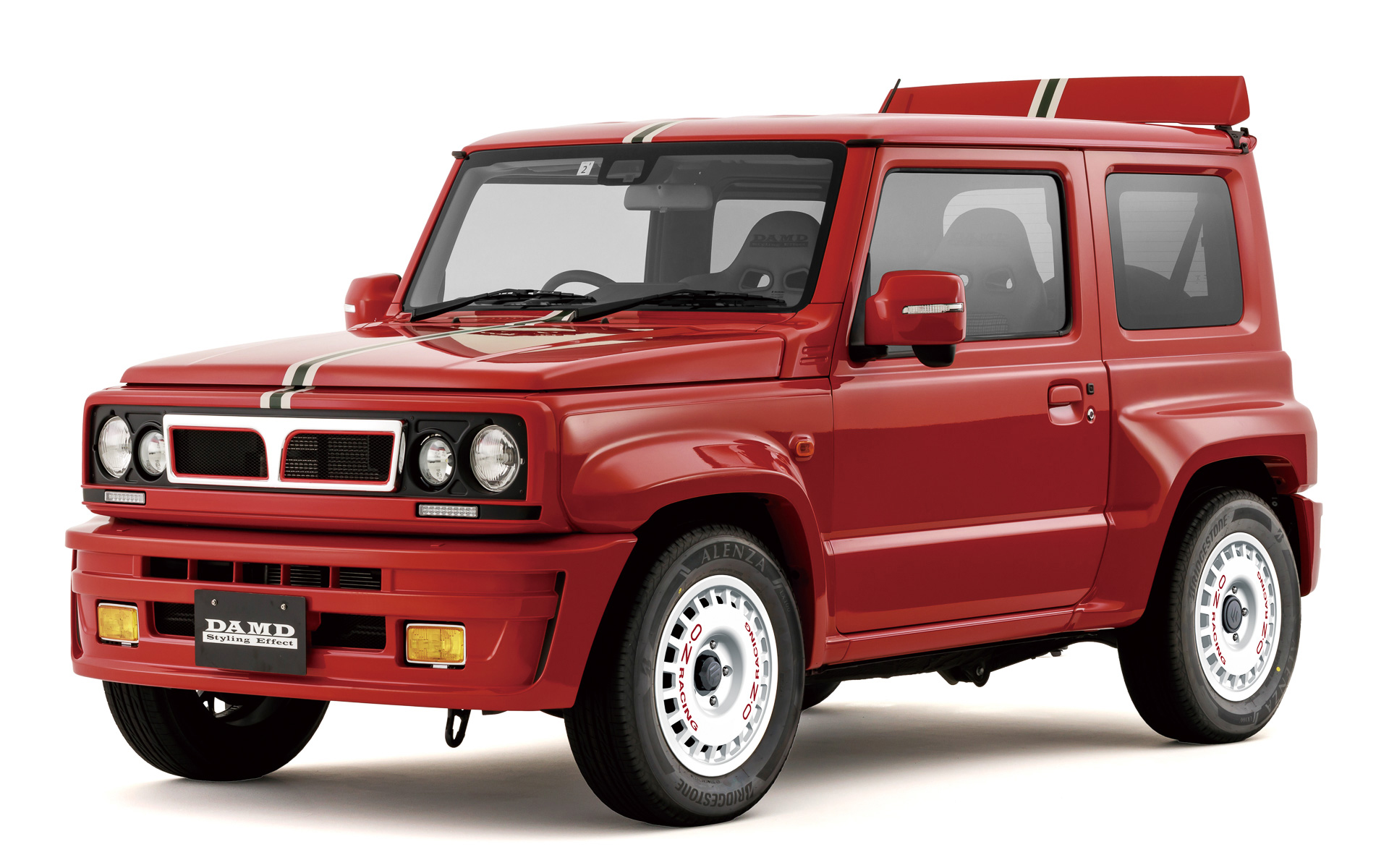 Front 3/4 view of a red Suzuki Jimny with a Lancia Delta Integrale bodykit