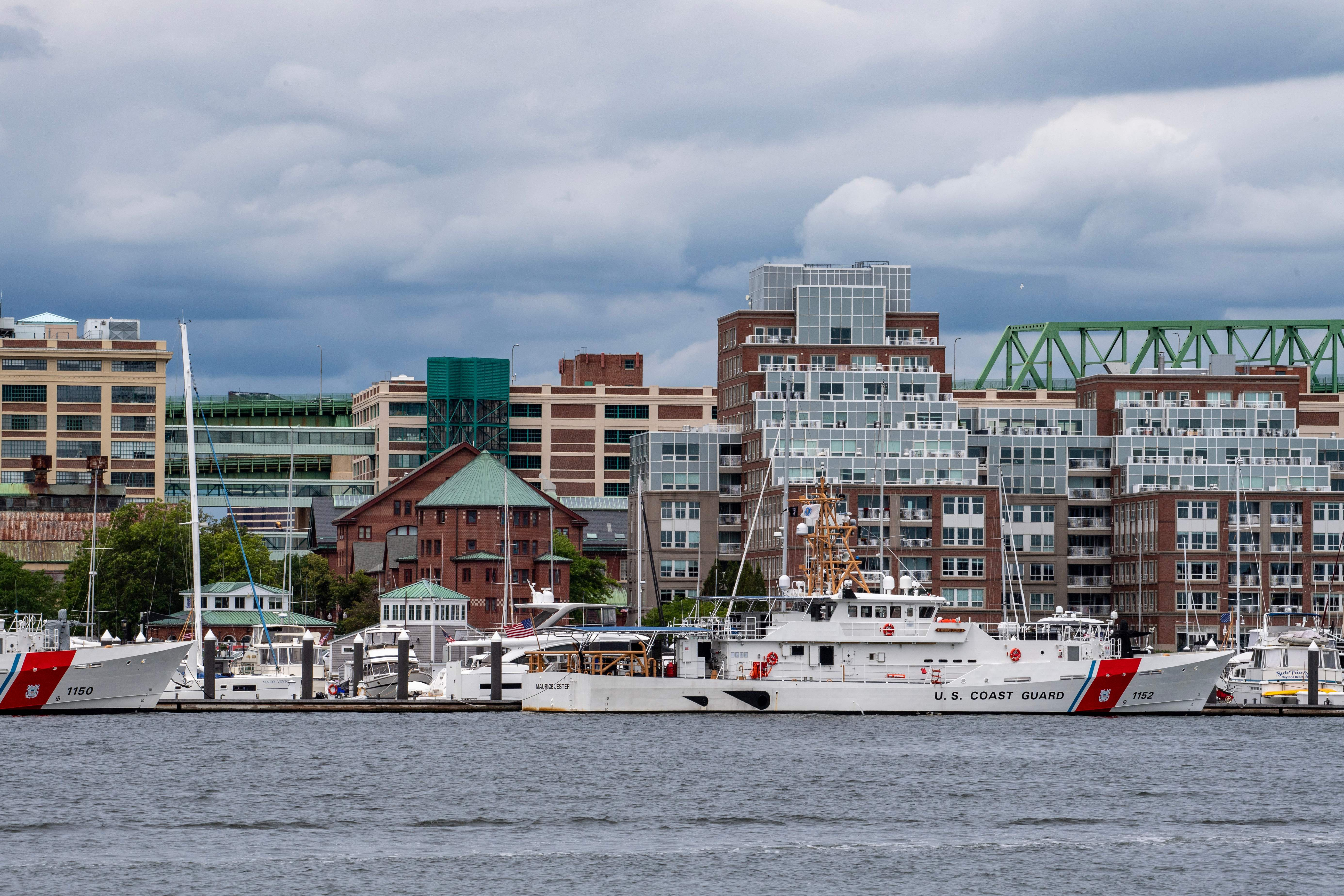 A US Coast Guard vessel sits in port in Boston Harbor across from the US Coast Guard Station Boston in Boston, Massachusetts, on June 19, 2023. A submersible vessel used to take tourists to see the wreckage of the Titanic in the North Atlantic has gone missing, triggering a search-and-rescue operation, the US Coast Guard said on June 19, 2023.