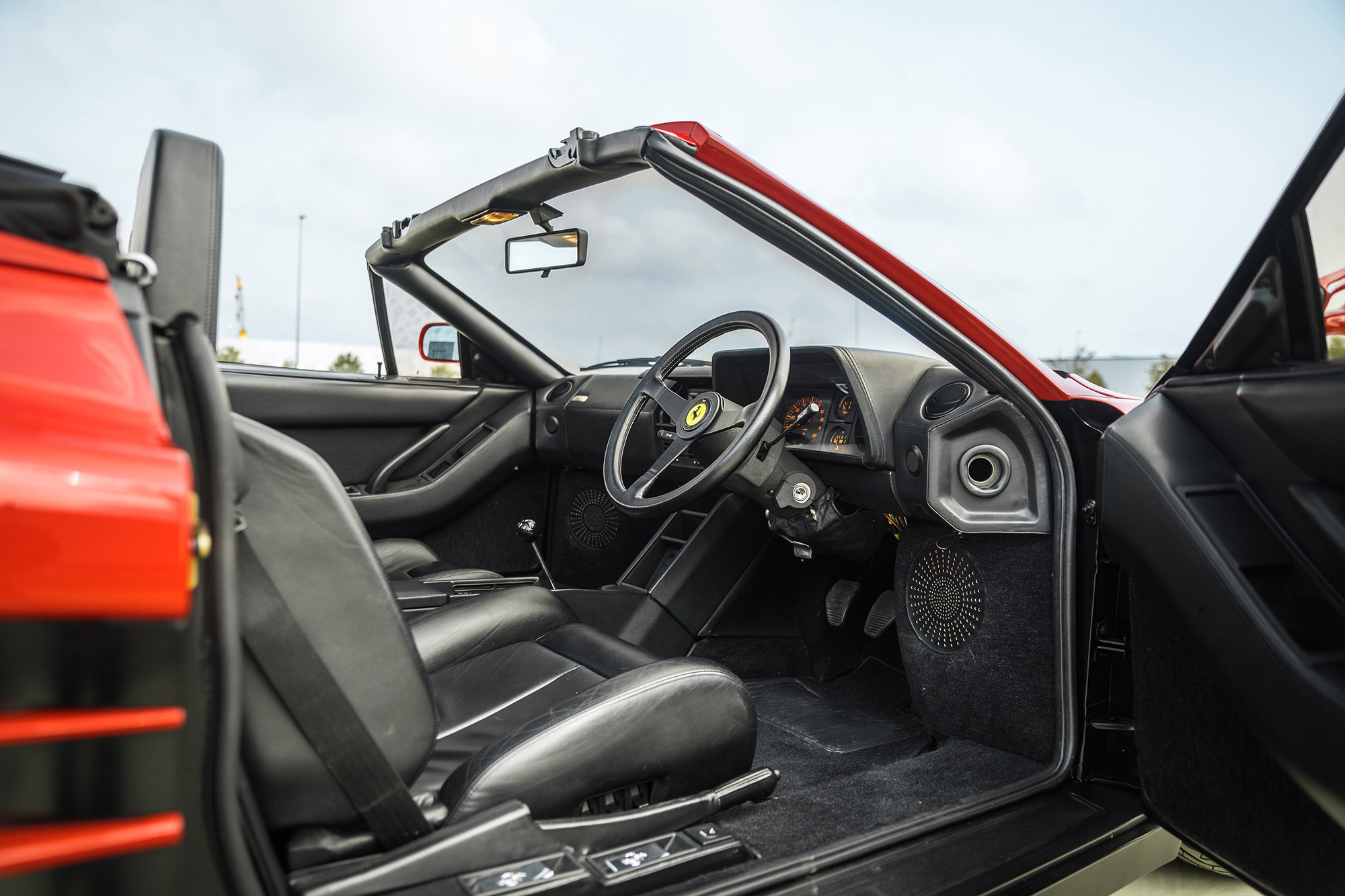 Interior view of red Ferrari Testarossa Pininfarina Spider 