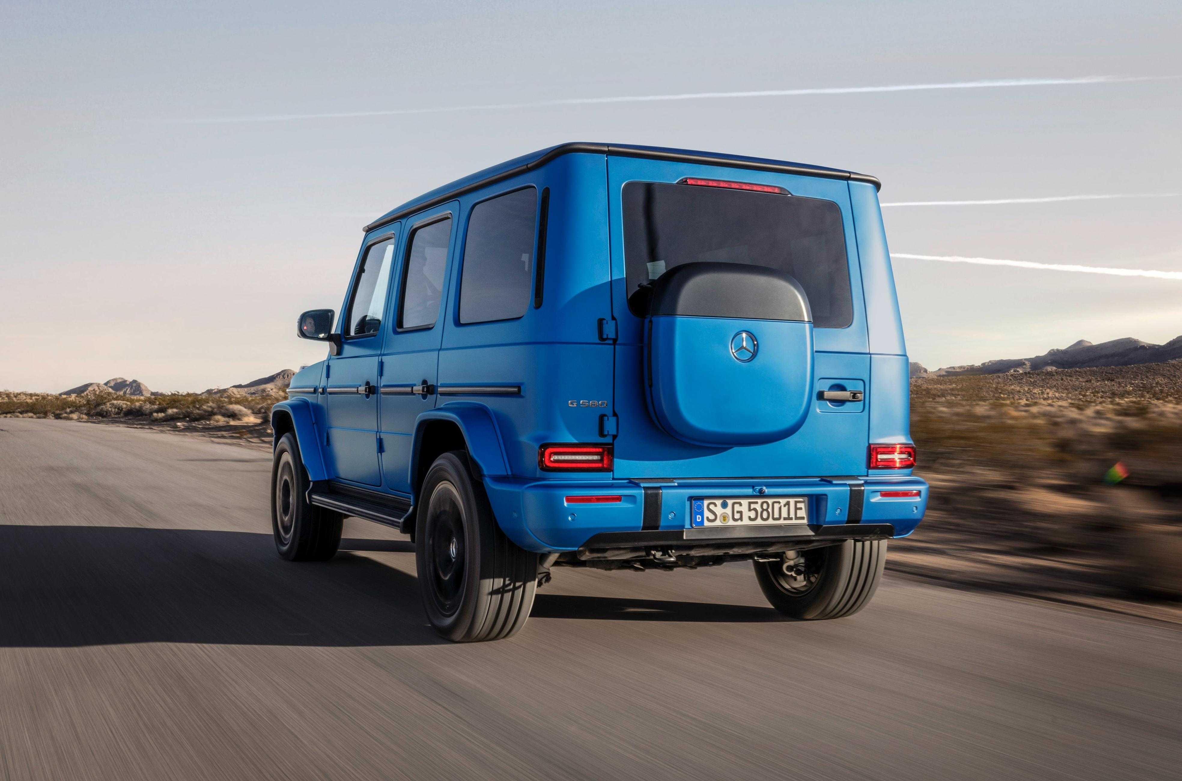 Rear 3/4 view of a blue 2025 Mercedes-Benz G580 EV