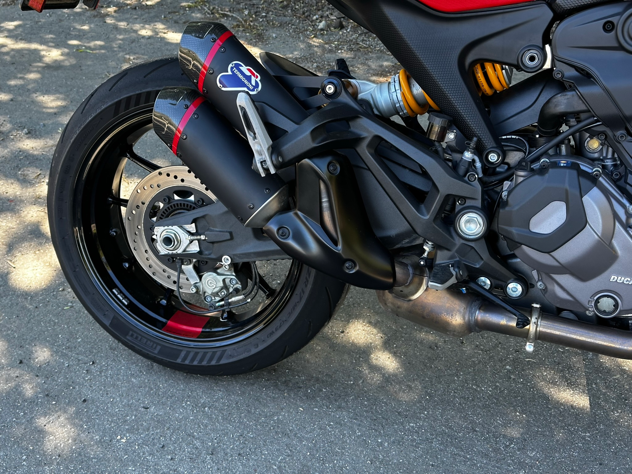 The exhaust and rear wheel of the 2023 Ducati Monster SP