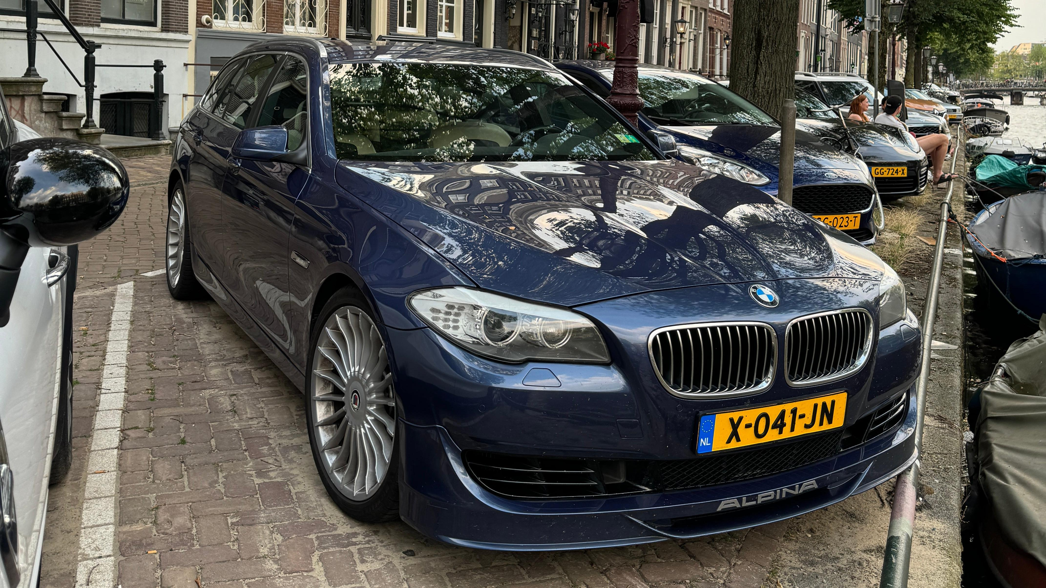 Front 3/4 view of a blue Alpina 5 Series wagon