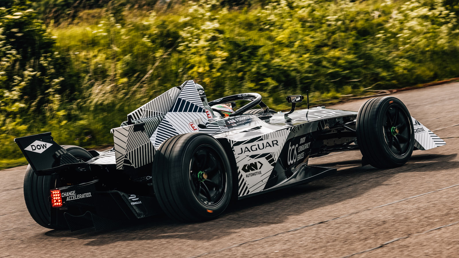 A photo of the rear of the Gen 3 Formula E car in a Jaguar camouflage wrap. 