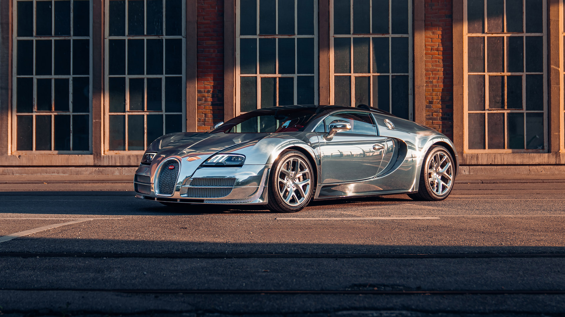 Front 3/4 view of an aluminum Bugatti Veyron Grand Sport Vitesse