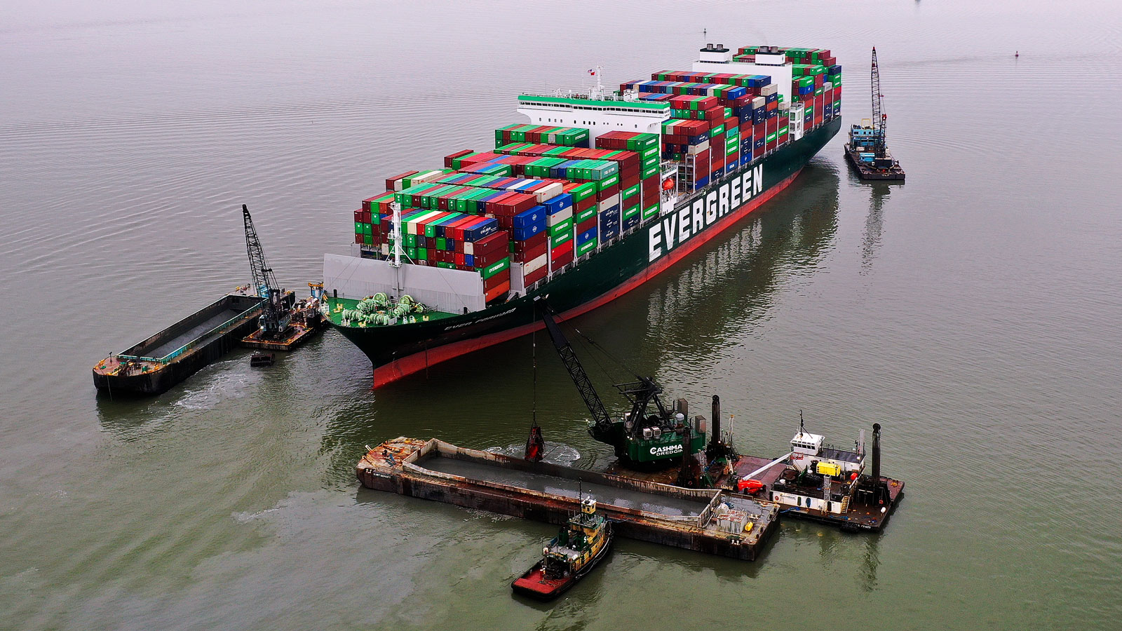 Cranes prepare to unload the Ever Forward ship. 