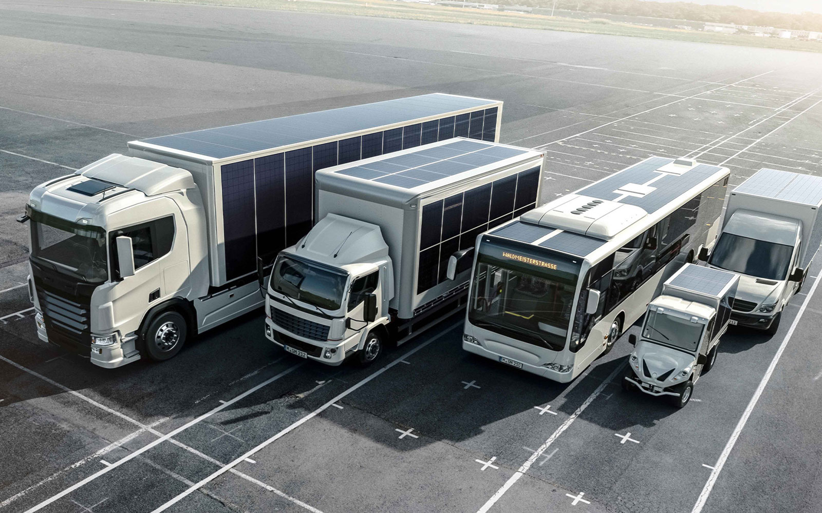 A render of a group of trucks covered in solar panels. 