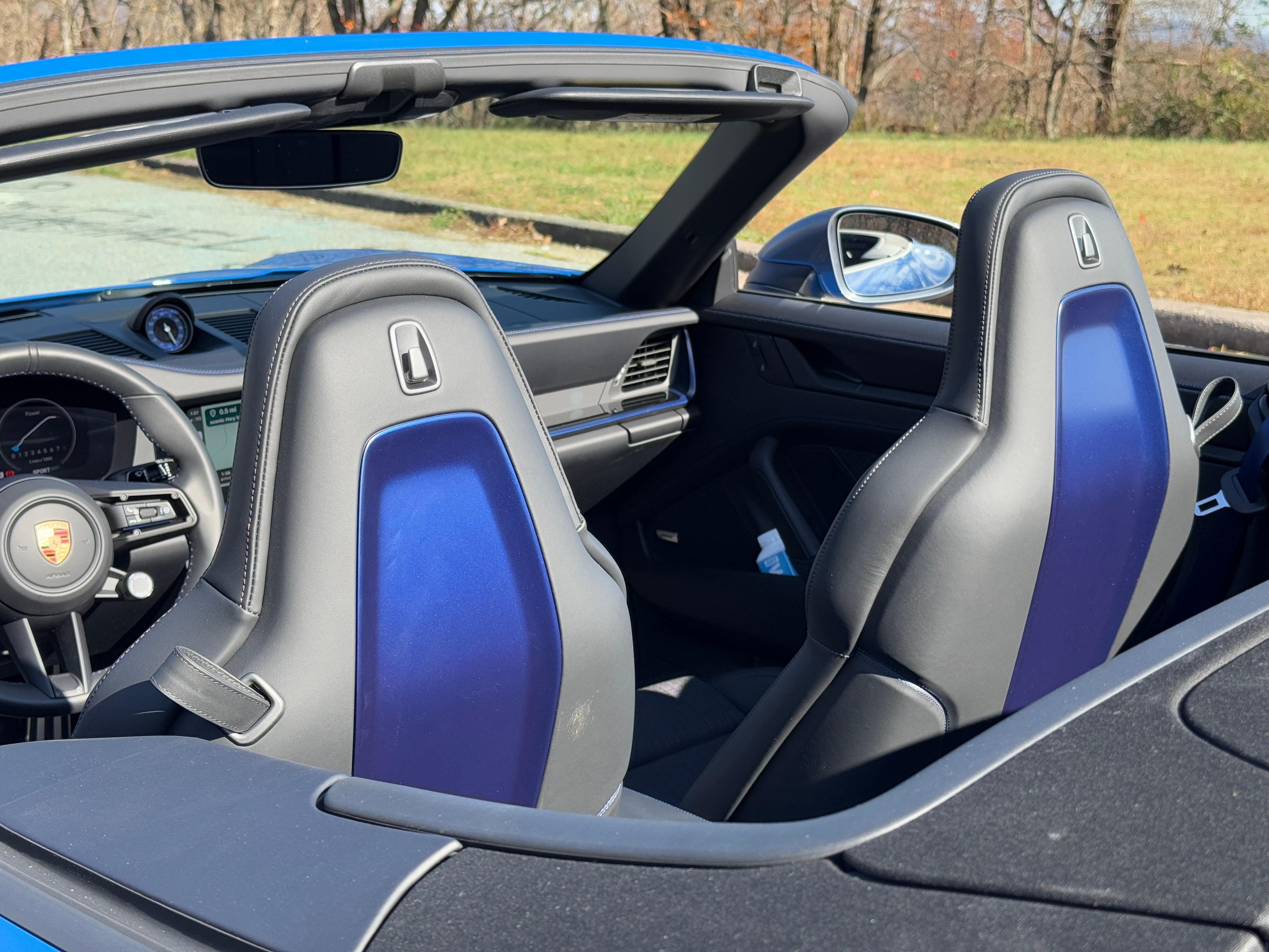 Seatbacks of a blue 2025 Porsche 911 Carrera T cabriolet