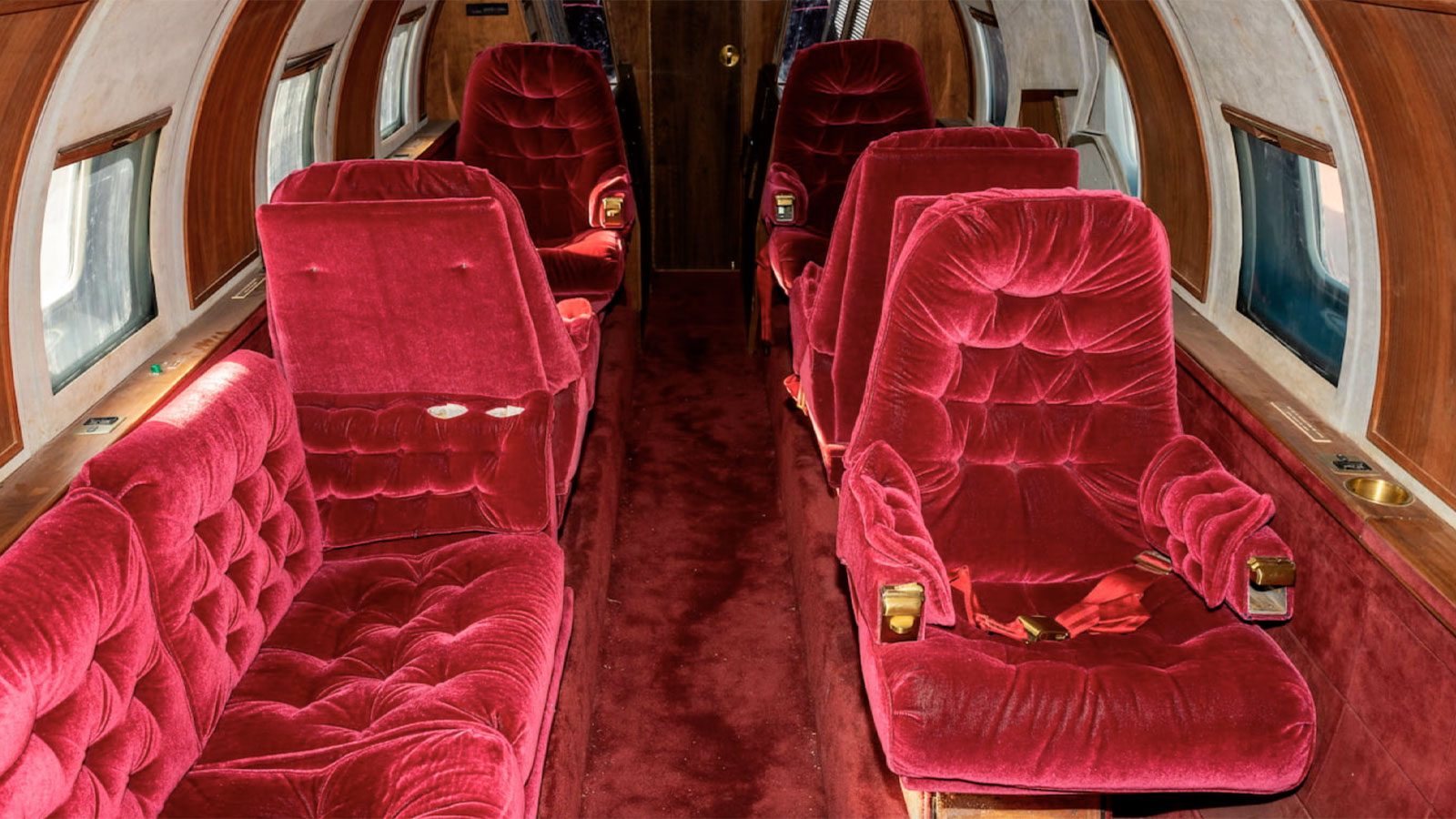 A photo of the red interior of the old plane. 