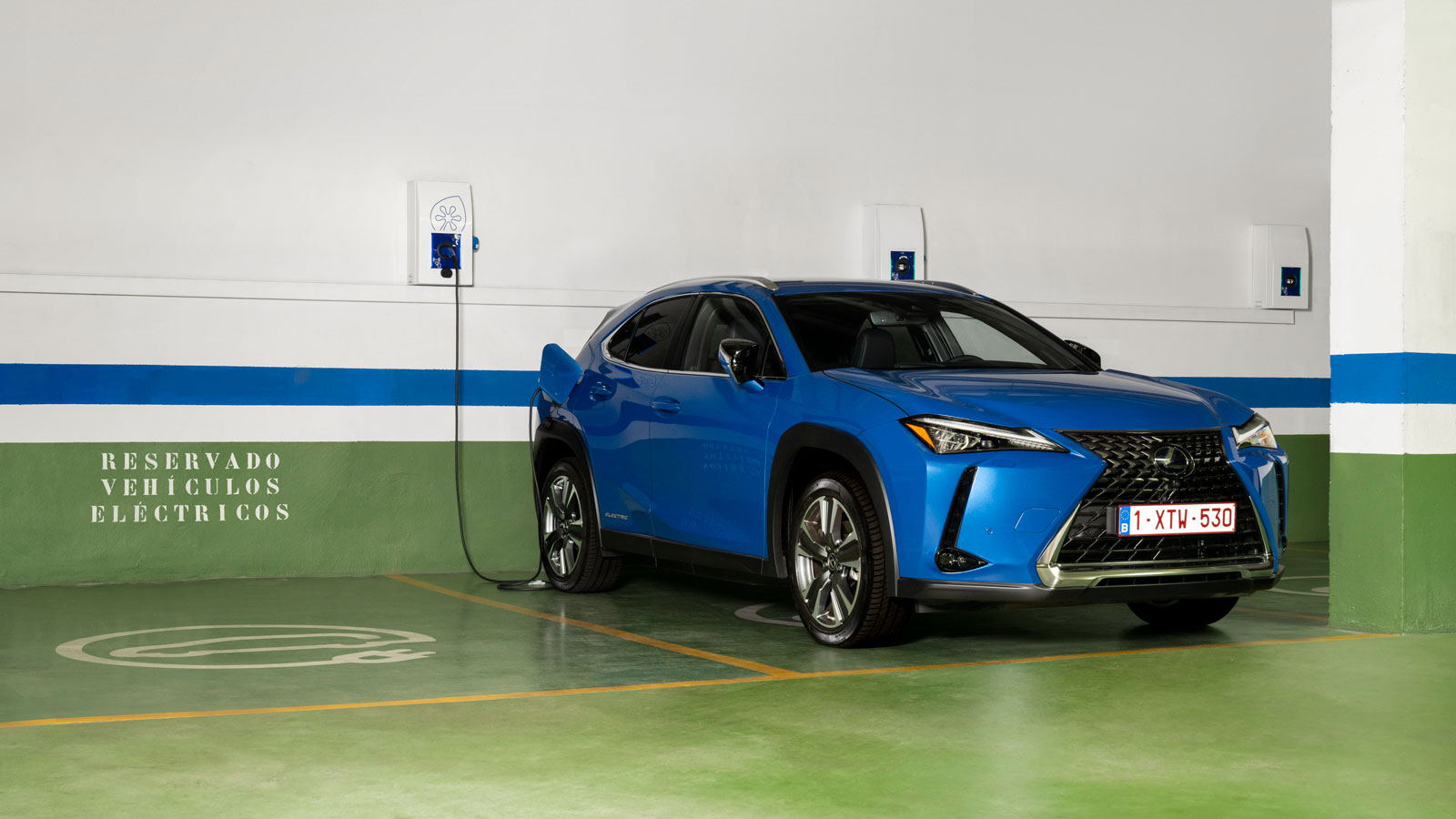 A photo of a blue Lexus UX 300e plug-in hybrid SUV. 