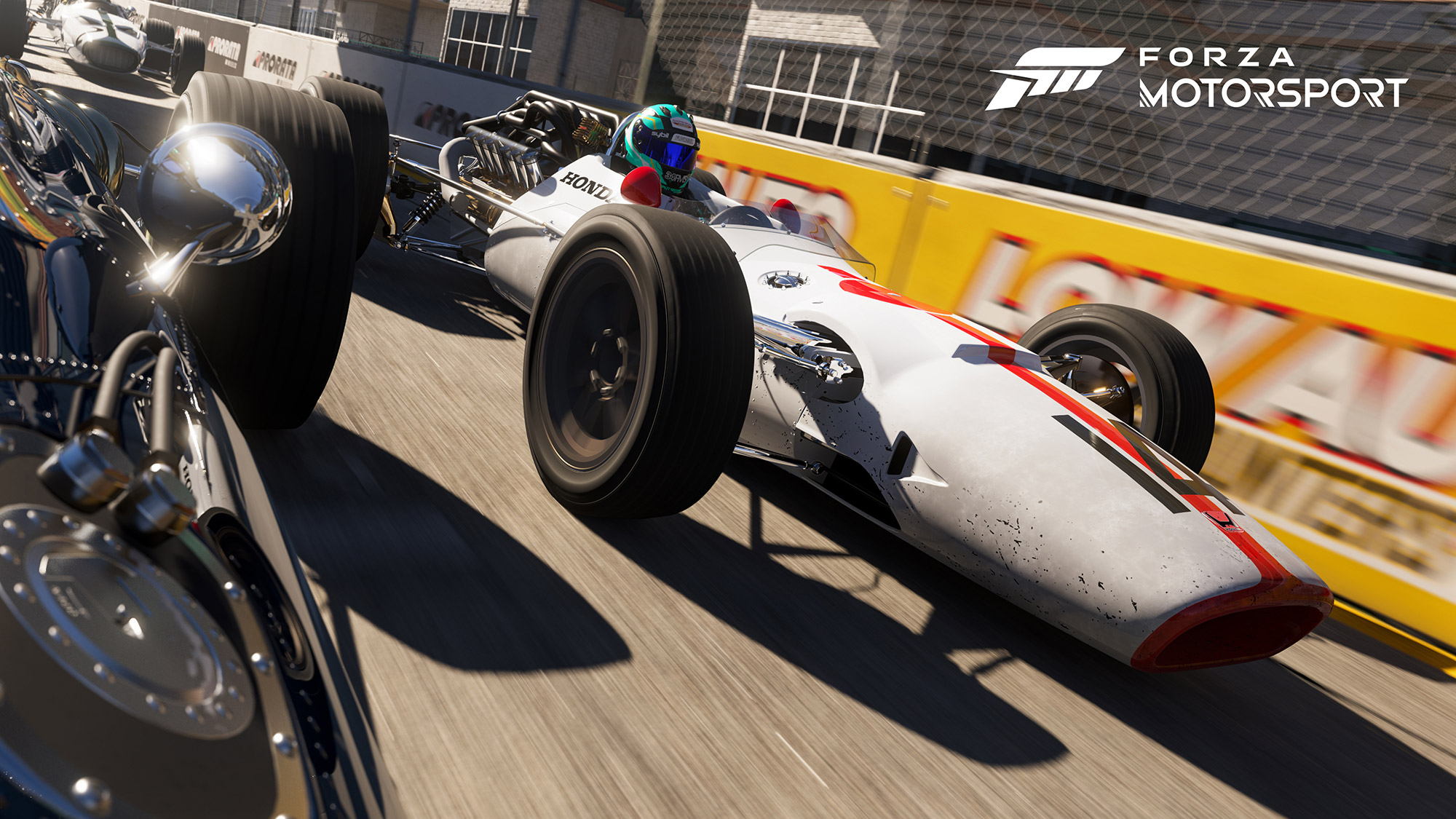 A promotional image from the new Forza Motorsport showing a vintage Honda F1 car on track.