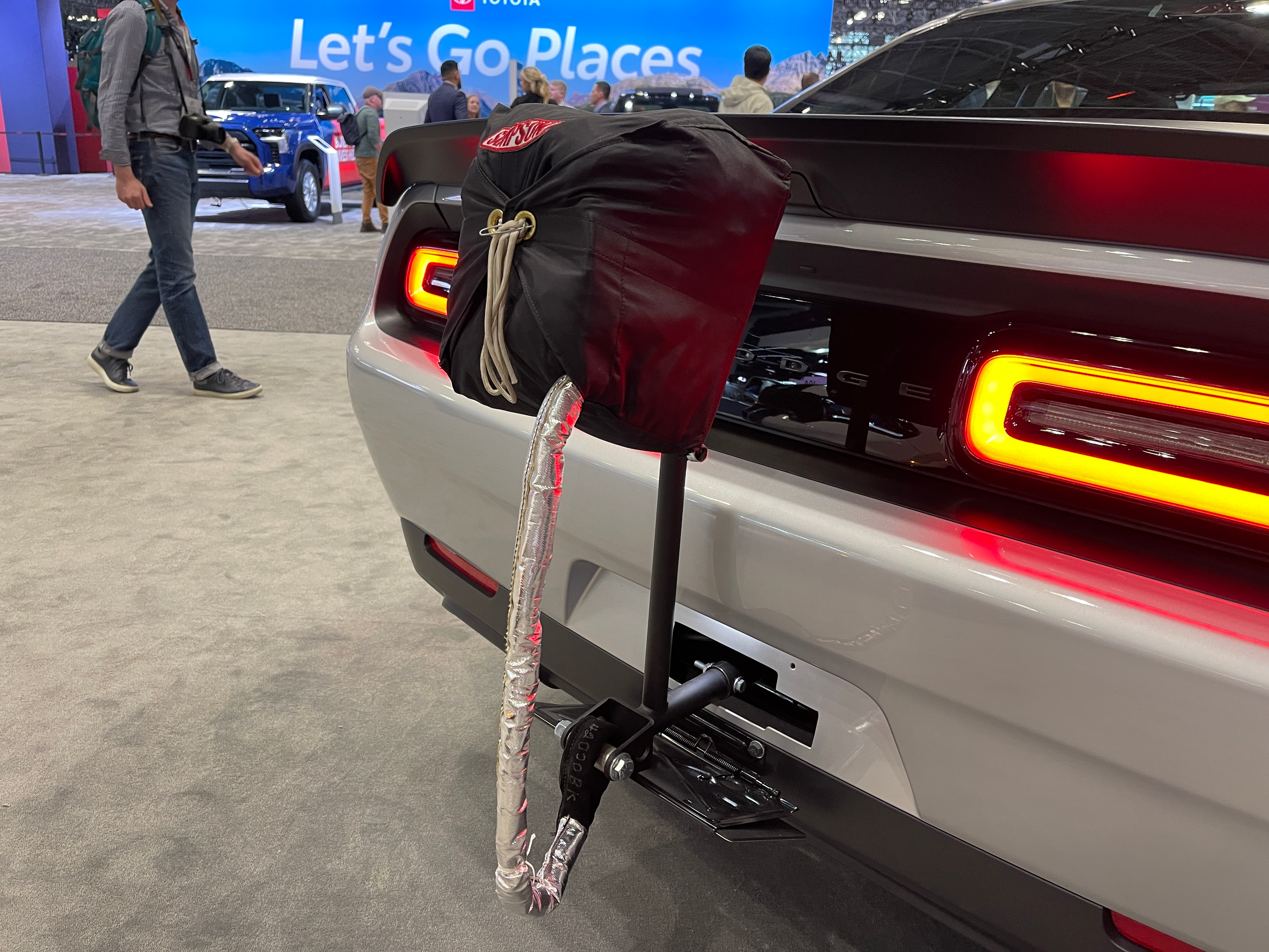 A silver Dodge Challenger SRT Demon 170.