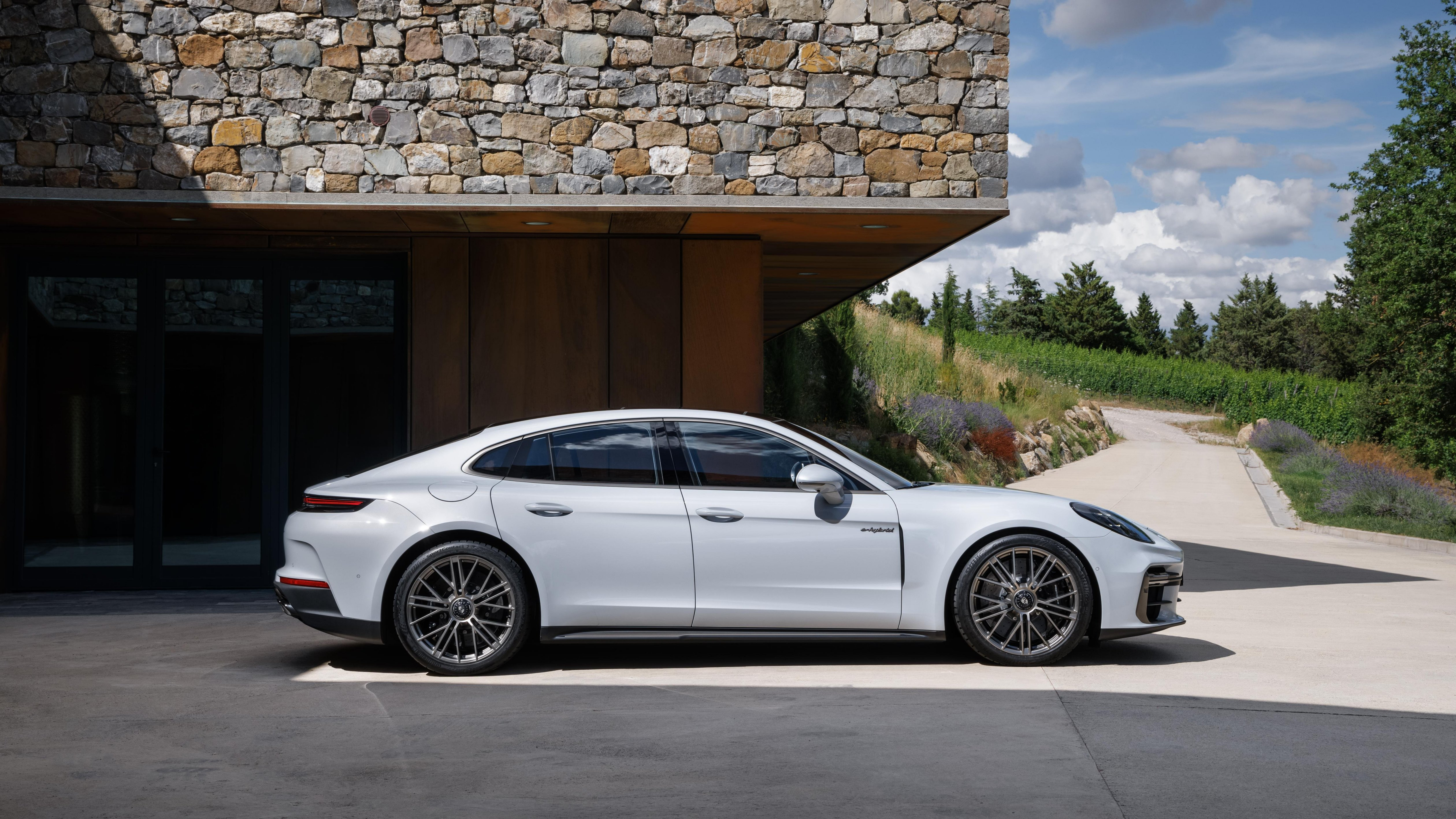 Side view of a white Porsche Panamera Turbo S E-Hybrid