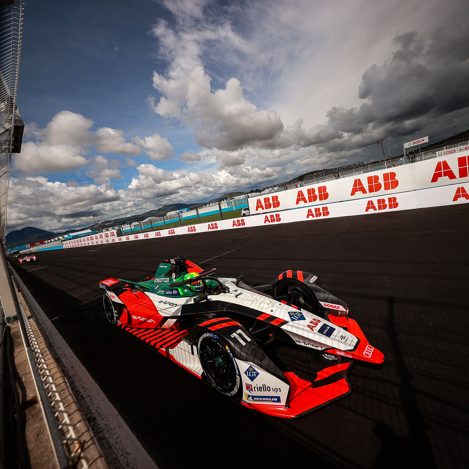 A photo of Lucas Di Grassi driving an Audi Formula E car in Mexico. 