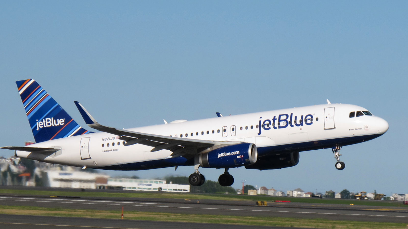 A jetBlue aircraft takes off