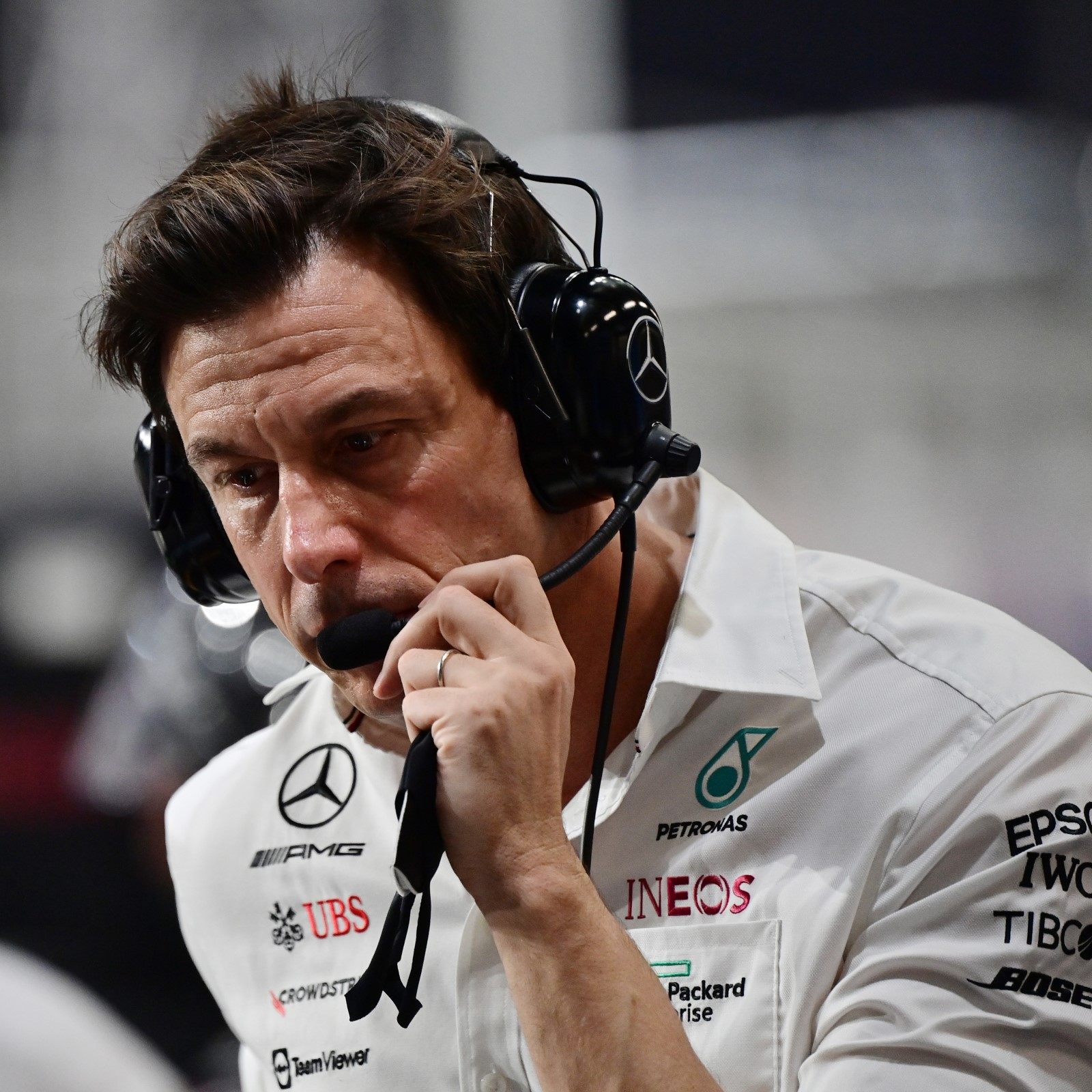 A photo of Mercedes boss Toto Wolff talking in a radio. 