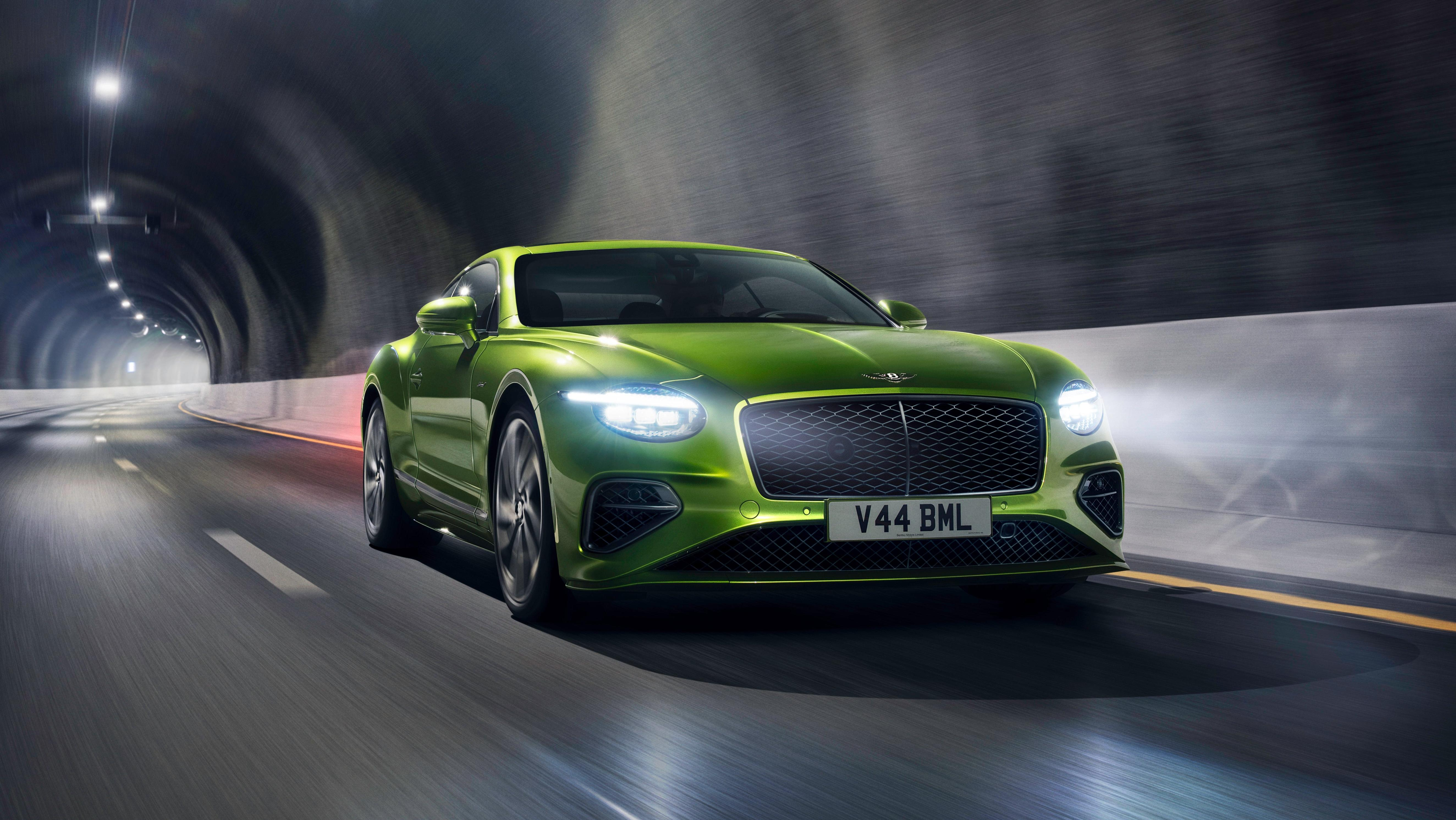 Front 3/4 view of a green Bentley Continental GT Speed