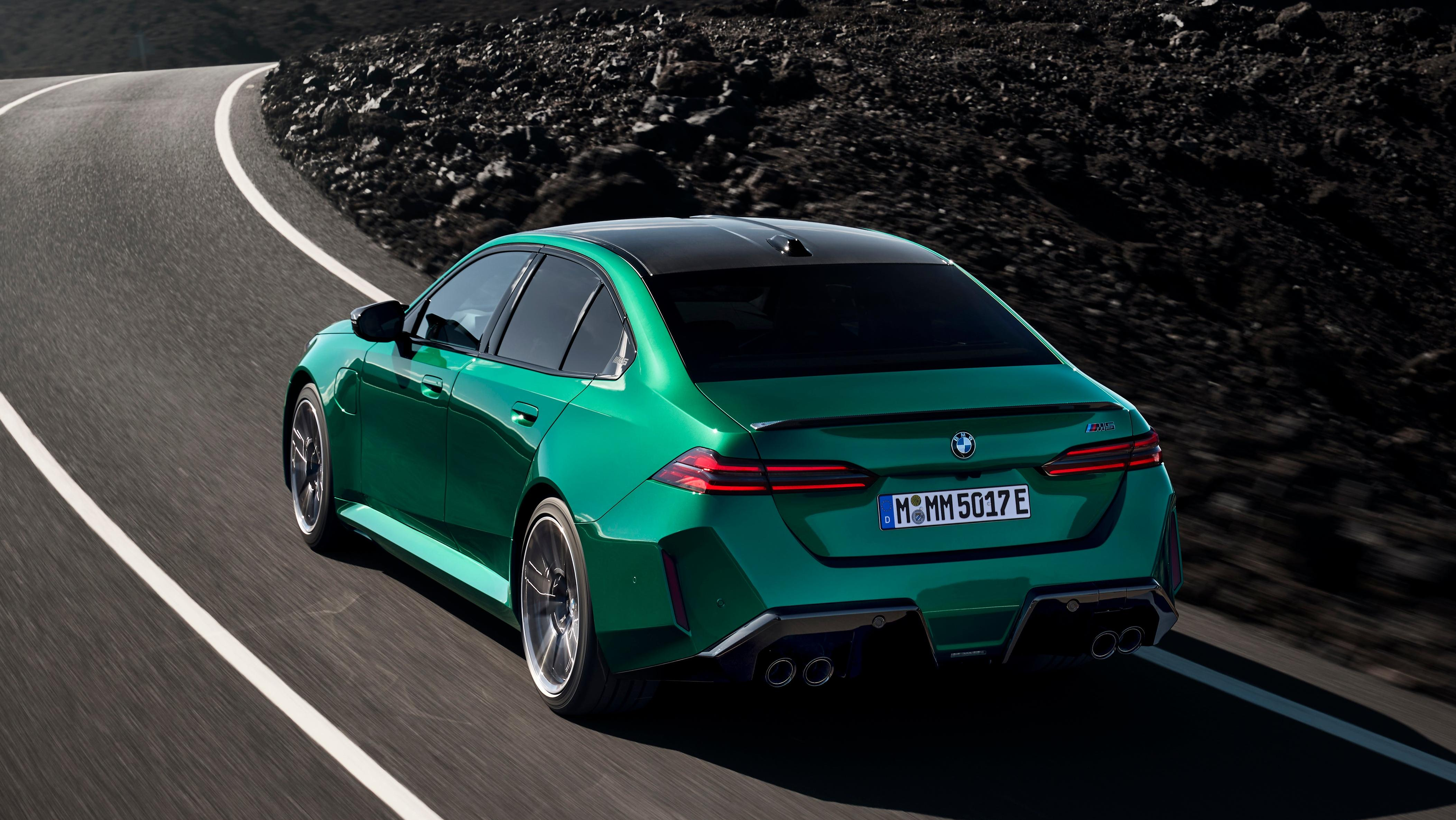 rear 3/4 shot of a green M5