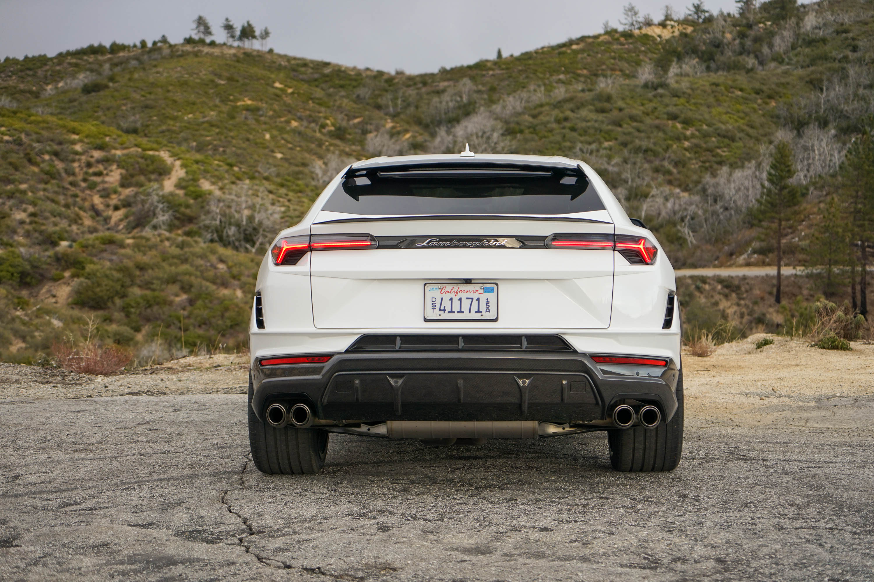 The rear view of a white 2023 Lamborghini Urus Performante