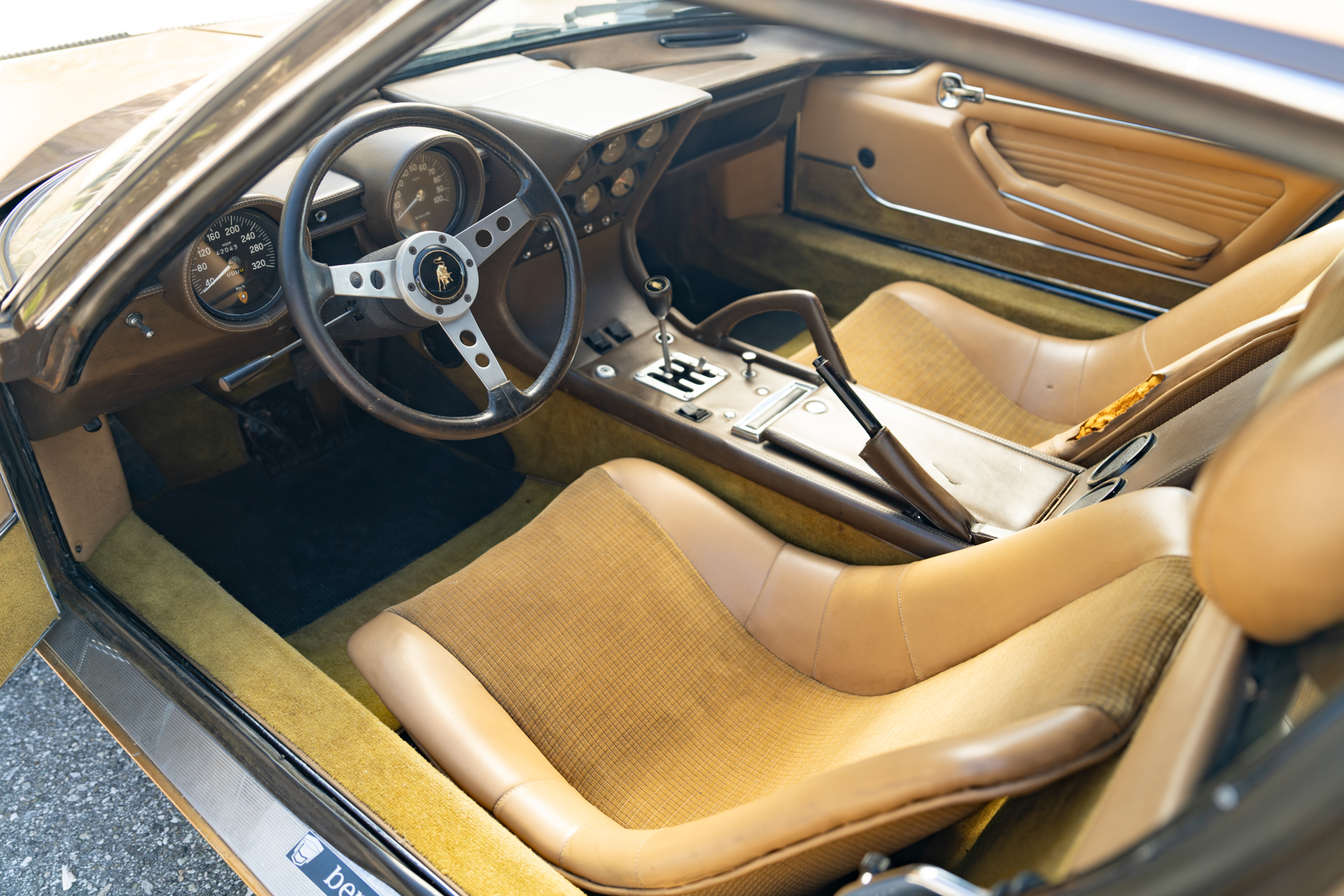 Interior of a brown Lamborghini Miura P400 S