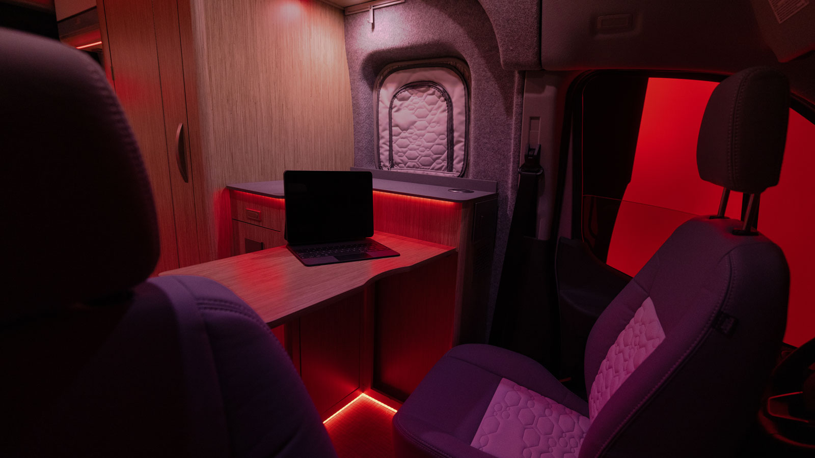 A photo of the red interior lights on the Winnebago electric RV. 