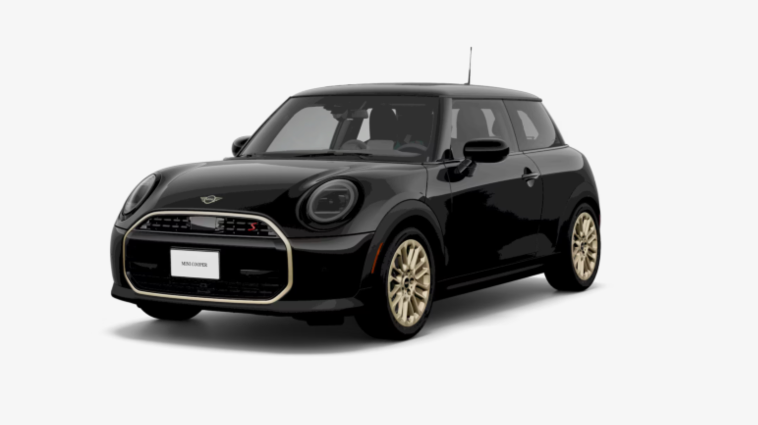 A screenshot of a black Mini Cooper S with Vibrant Silver (aka light gold) wheels and trim around the grille.